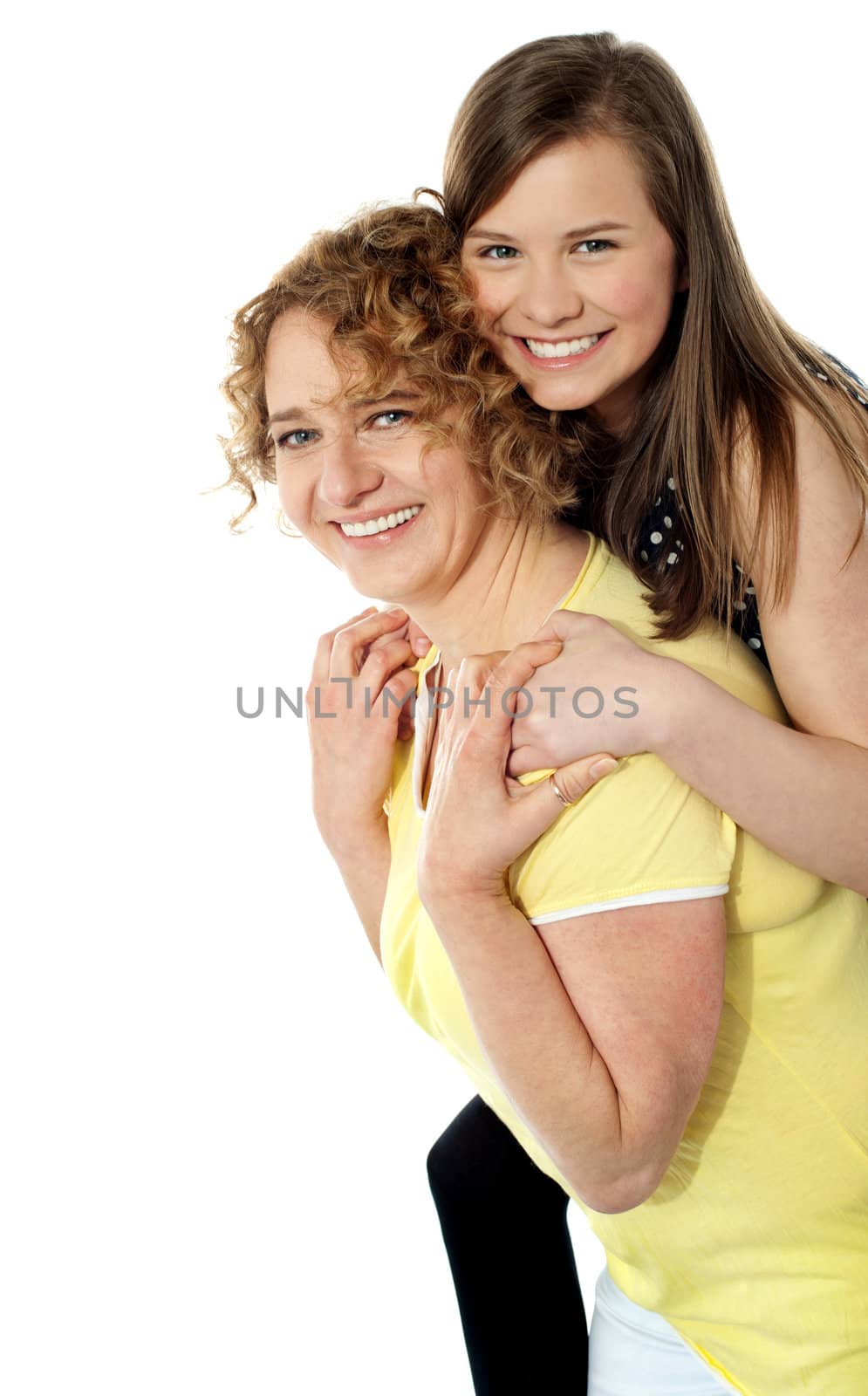 Mother giving piggy ride to her cute beautiful daughter. All on white background