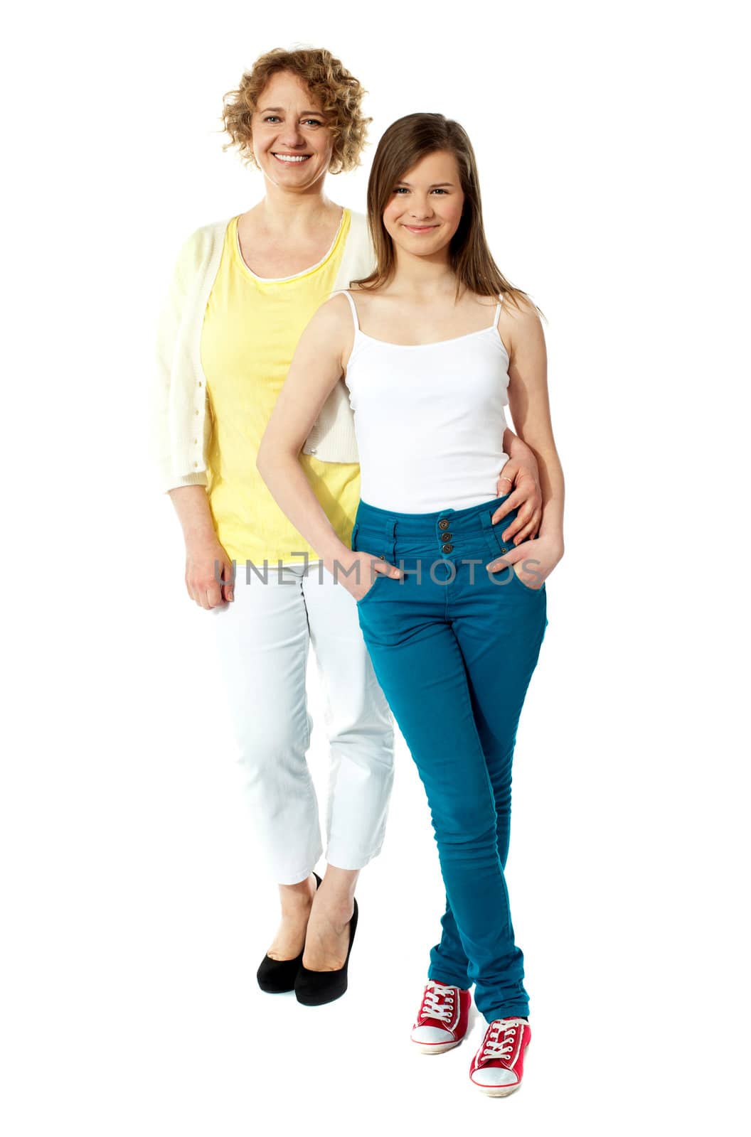 Full length portrait of mum and daughter by stockyimages