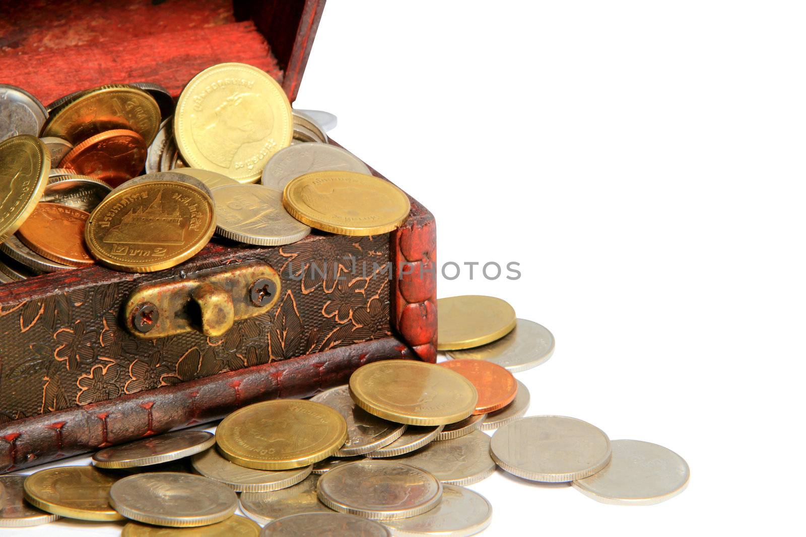 Wooden casket full of coins thai  isolated on white