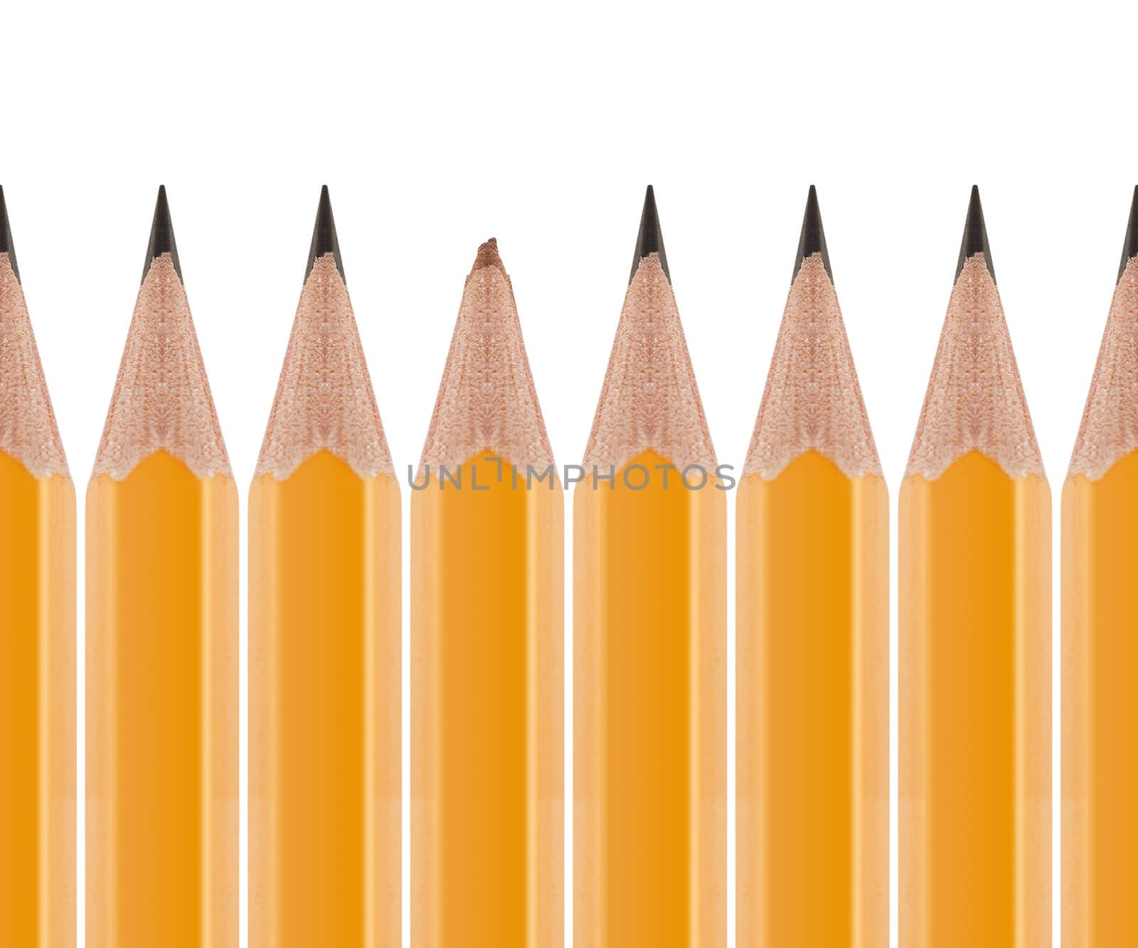 Broken pencil amongst sharp pencils isolated on white background.