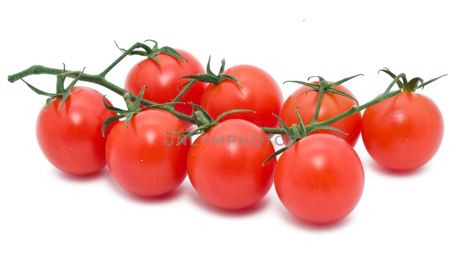Fresh tomatoes on whtie isolated background