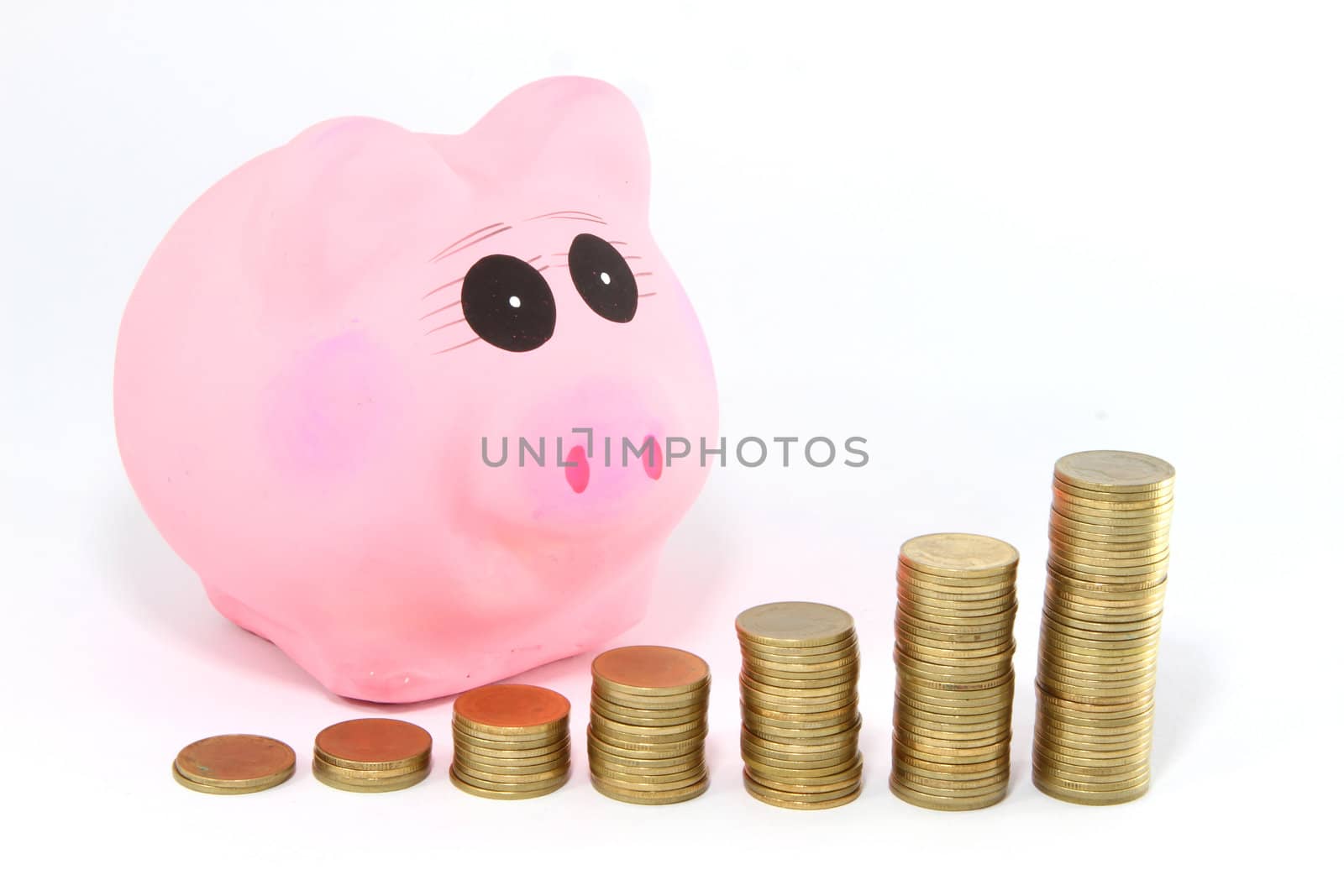 Piggy bank and coins isolated on white 
 by rufous