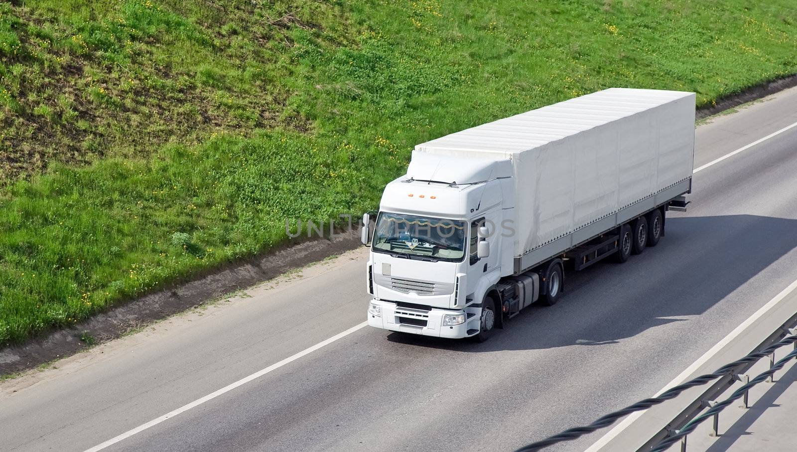 White truck on a highway