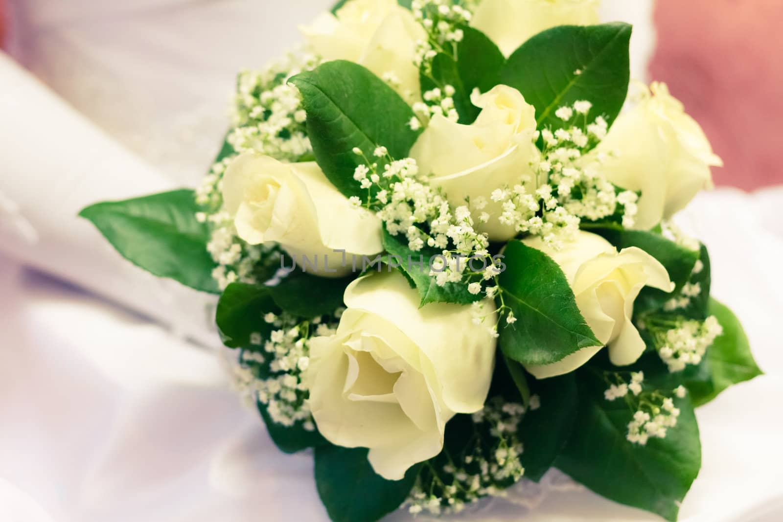 beautiful bouquet of the bride executed from light beige roses