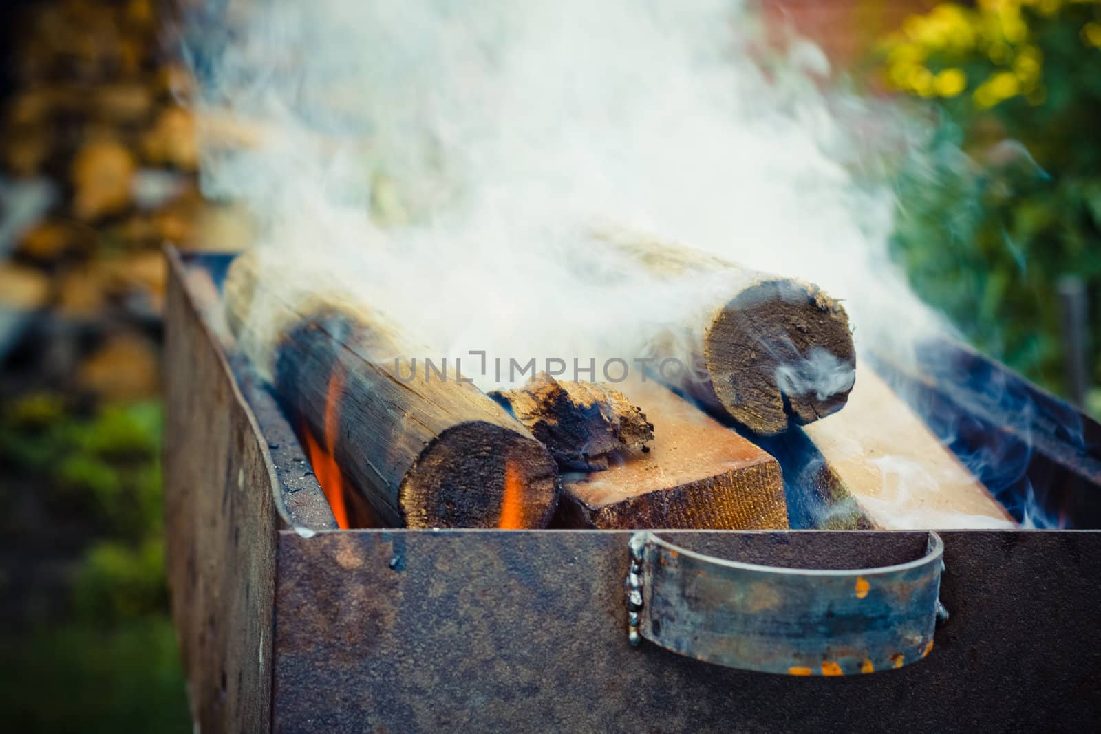 Hot, red burning firewood of campfire