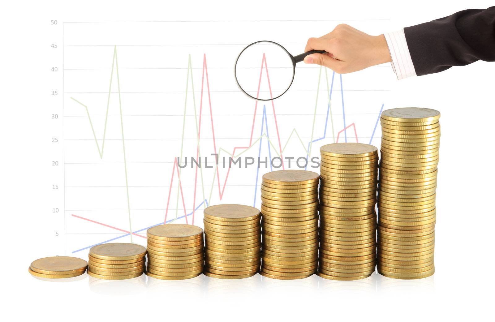Magnifying glass and lots of gold coins