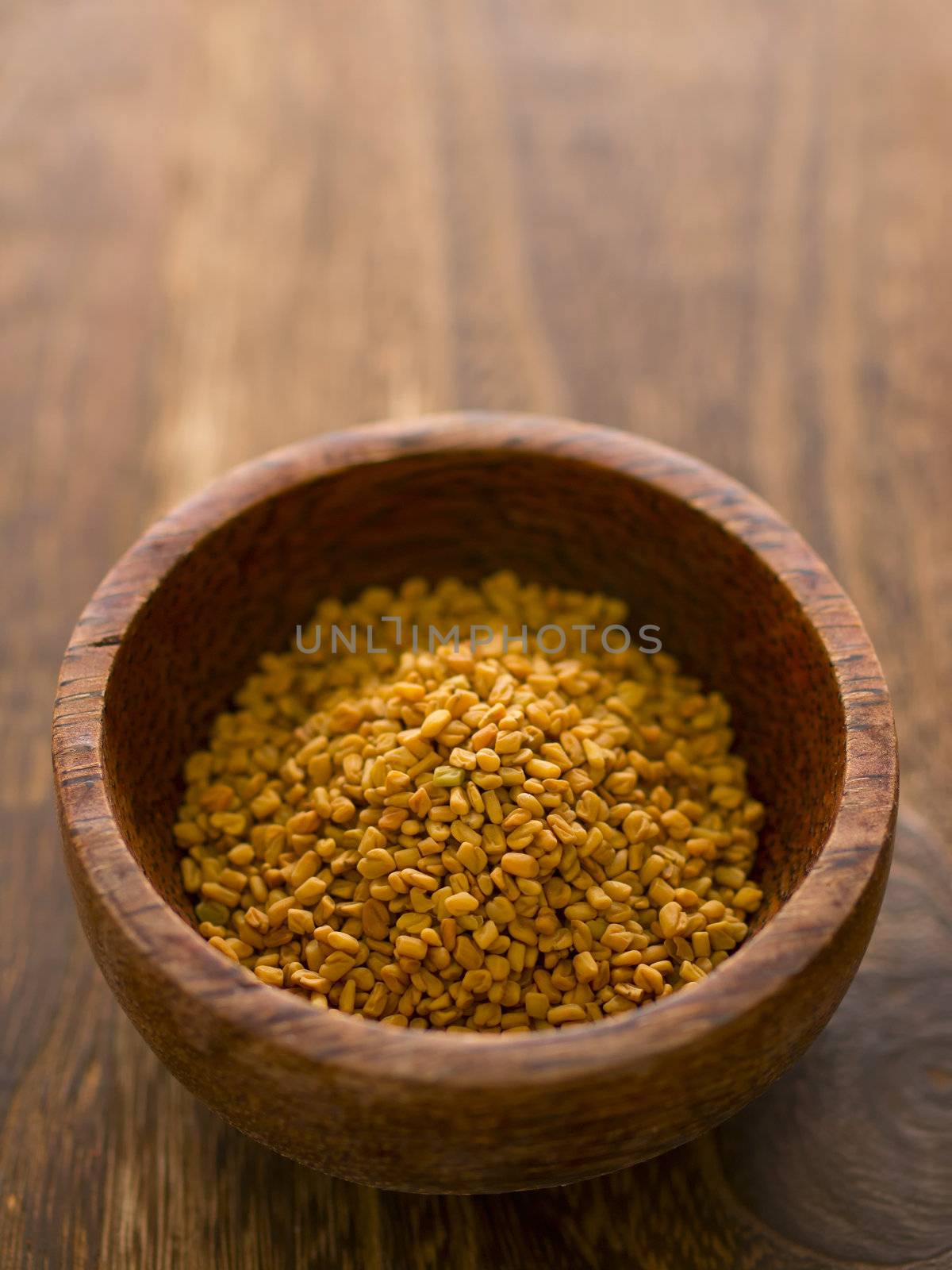 close up of a bowl of fenugreek seeds