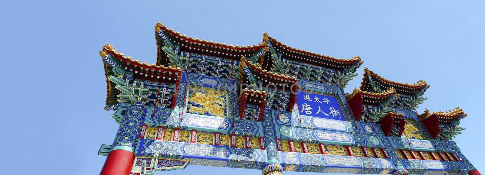 The gateway to Ottawa's Chinatown with beautiful colors and a blue sky.