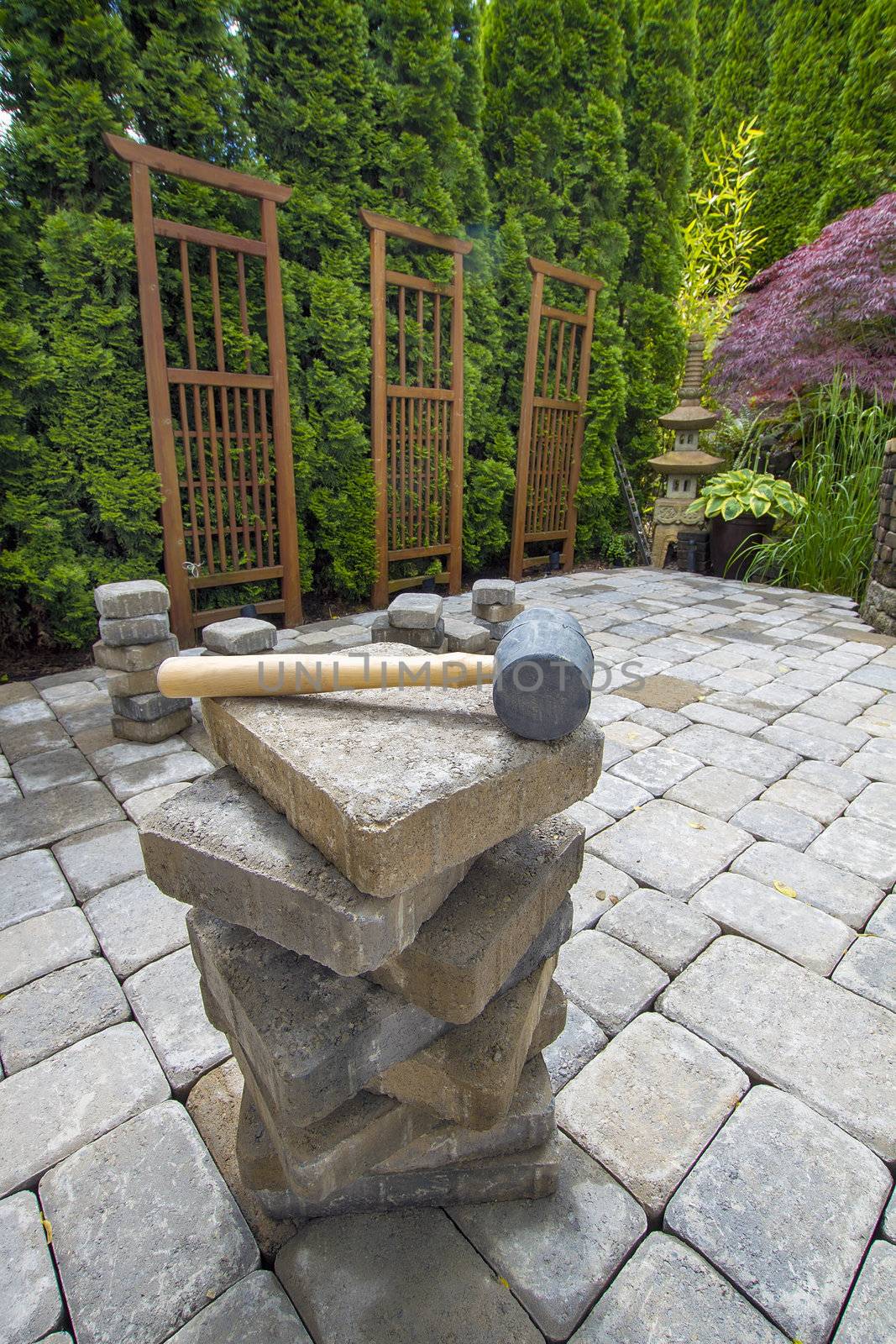 Stack of Cement Pavers On Backyard Patio for Garden Landscaping