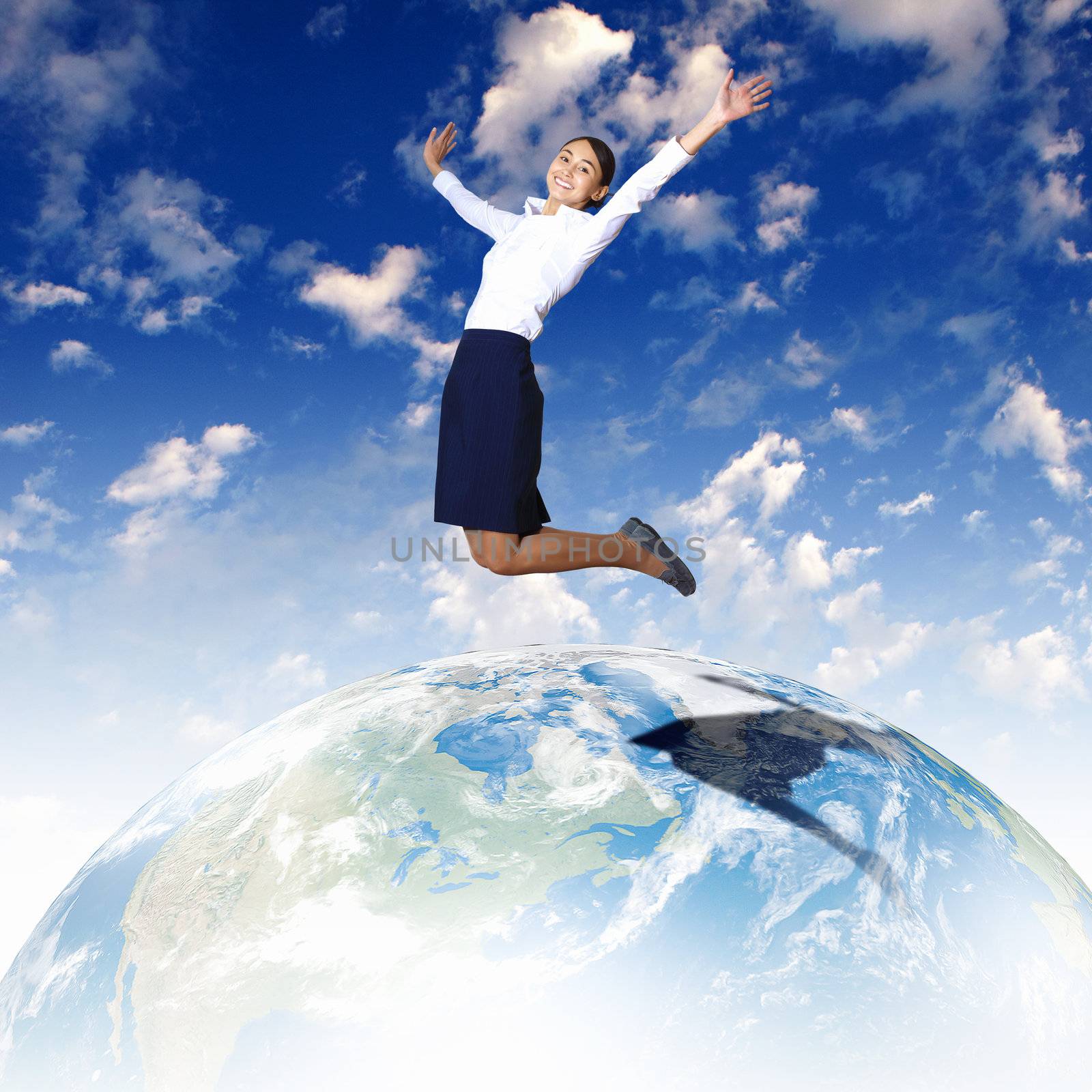 Business woman jumping up above the planet Earth