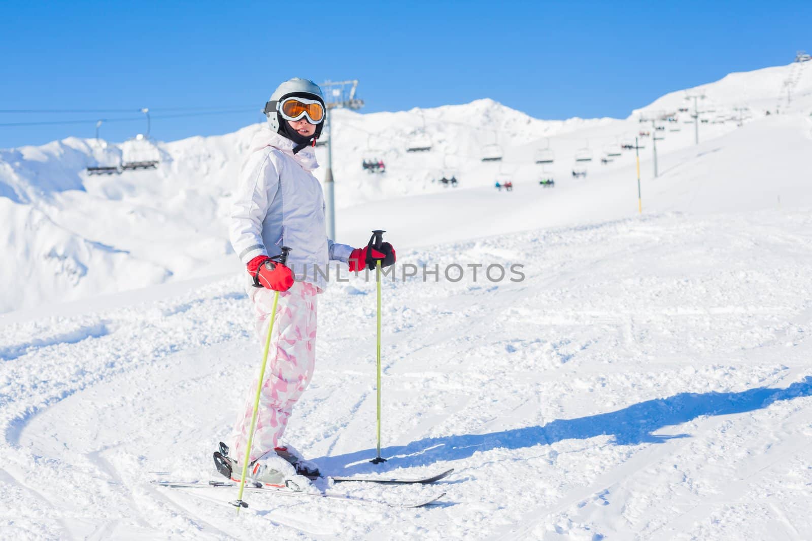 Young girl in ski outfit in the Zillertal Arena, Austria