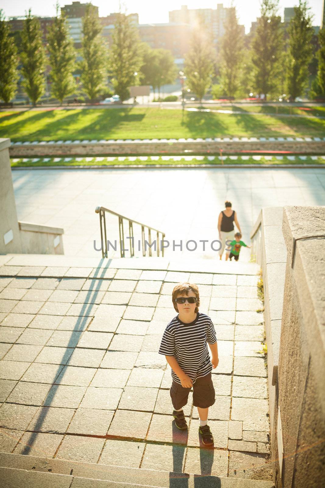 Boy with an attitude climbing stairs