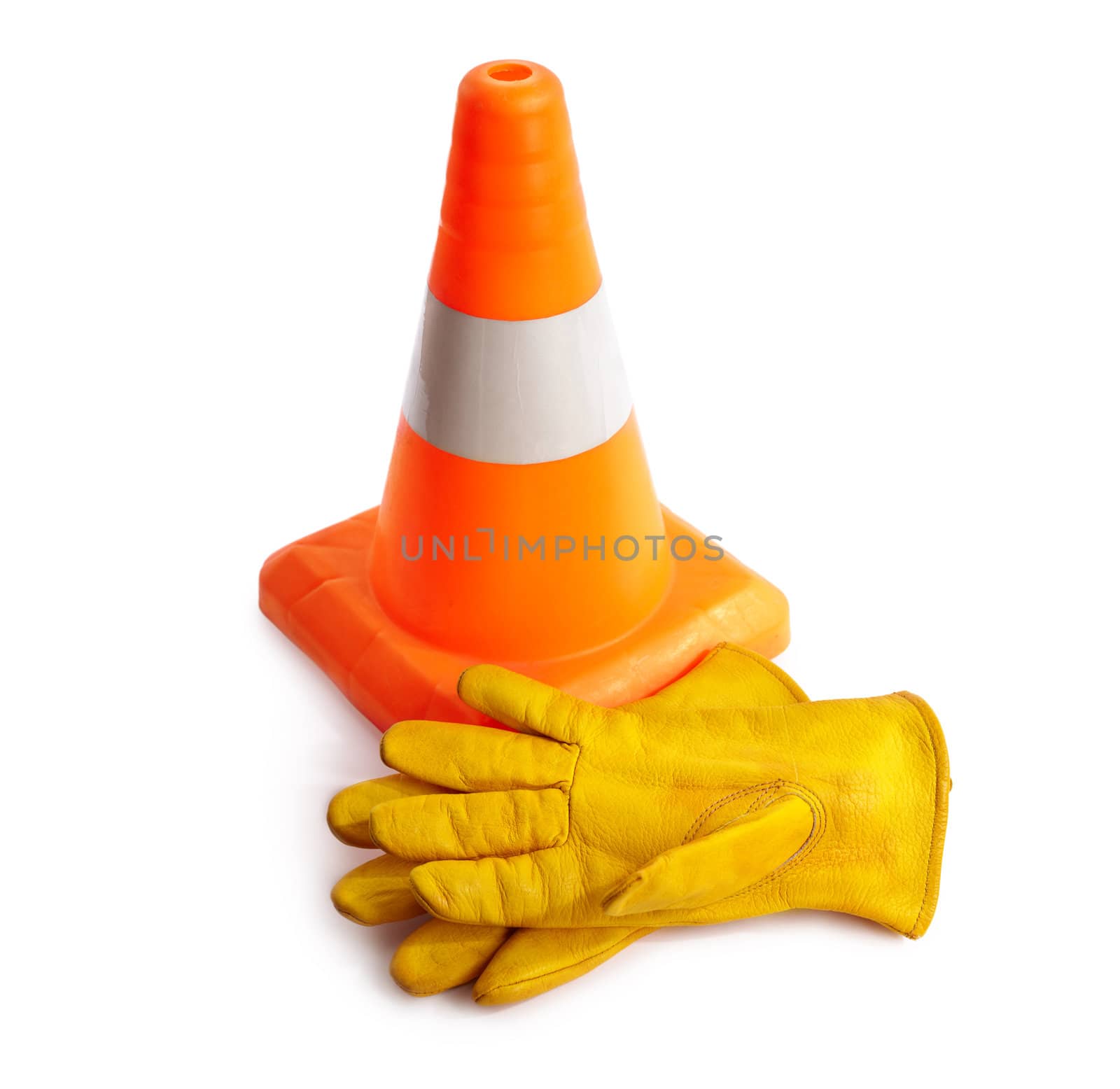 Traffic cone and working gloves isolated on white background, selective focus