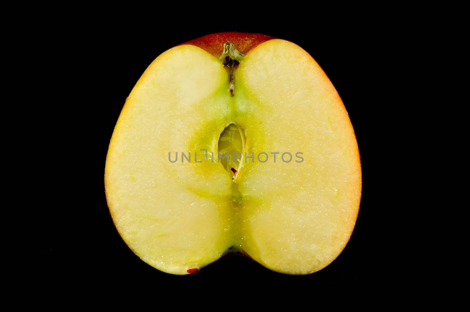 sliced apples on black background by digidreamgrafix