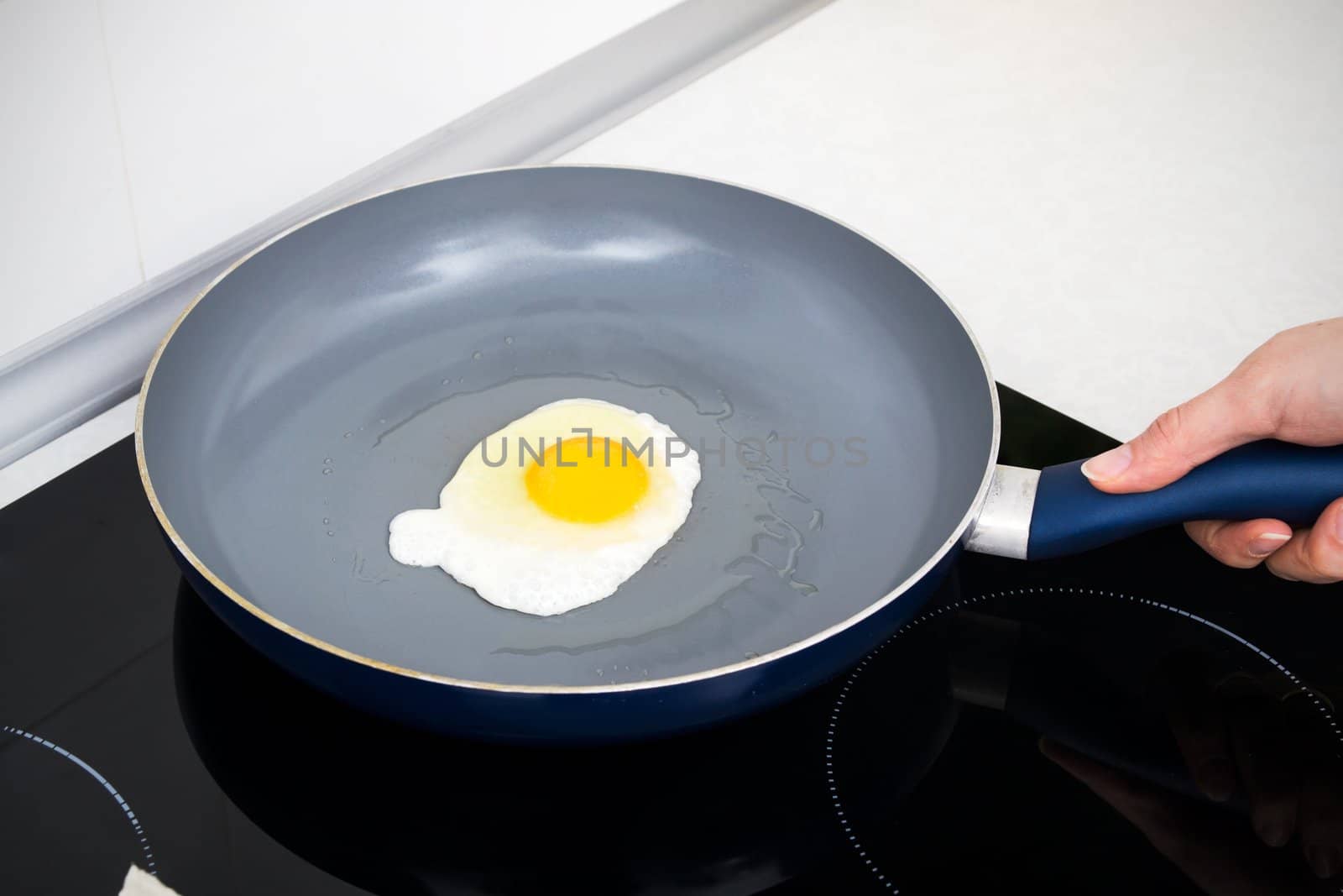 Salted egg in a frying pan