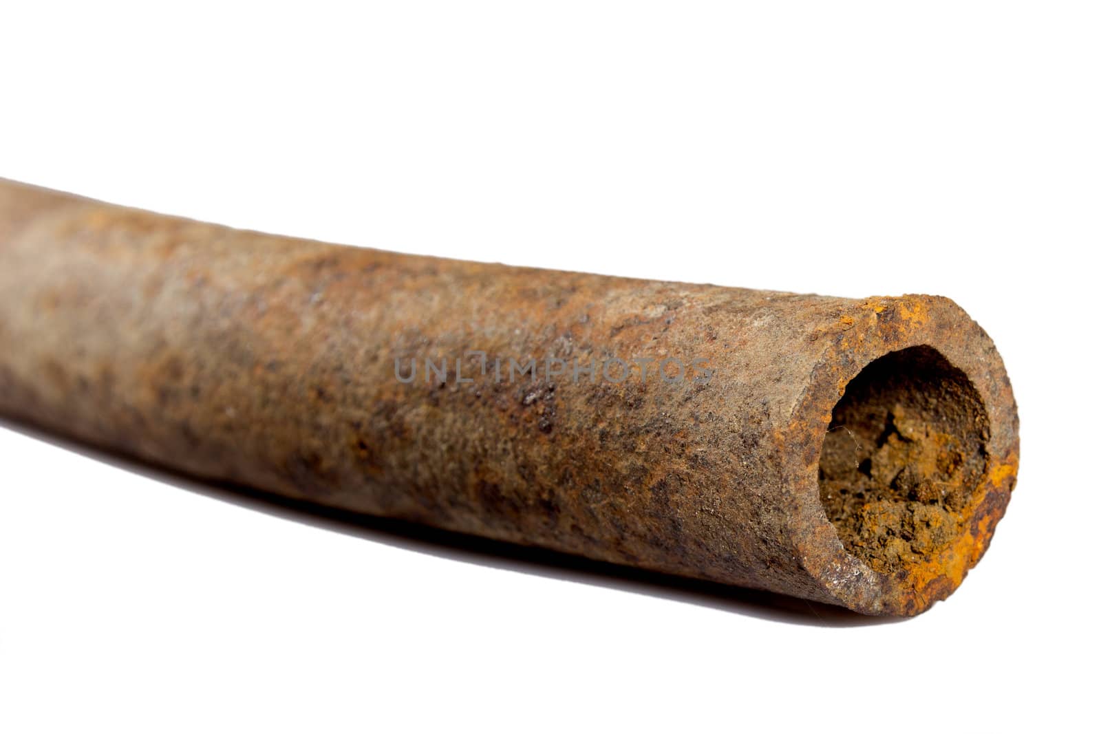 old corroded iron pipe on a white background