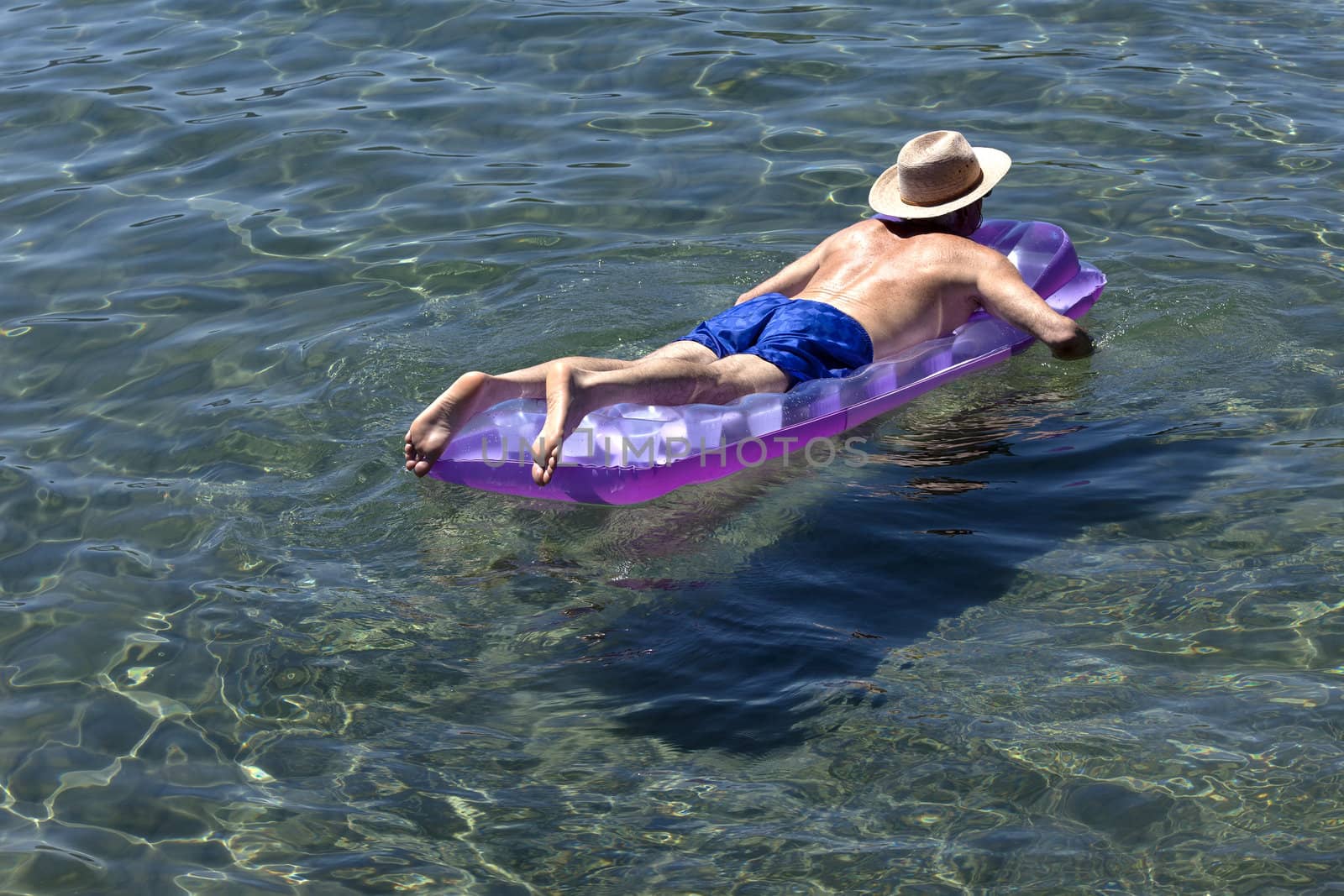 Enjoying a cool float on Lake Tahoe water, CA.