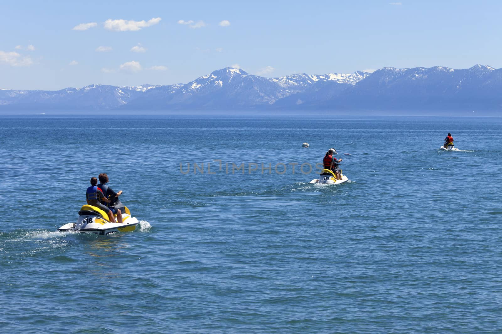 Water scooters on lake Tahoe, CA. by Rigucci