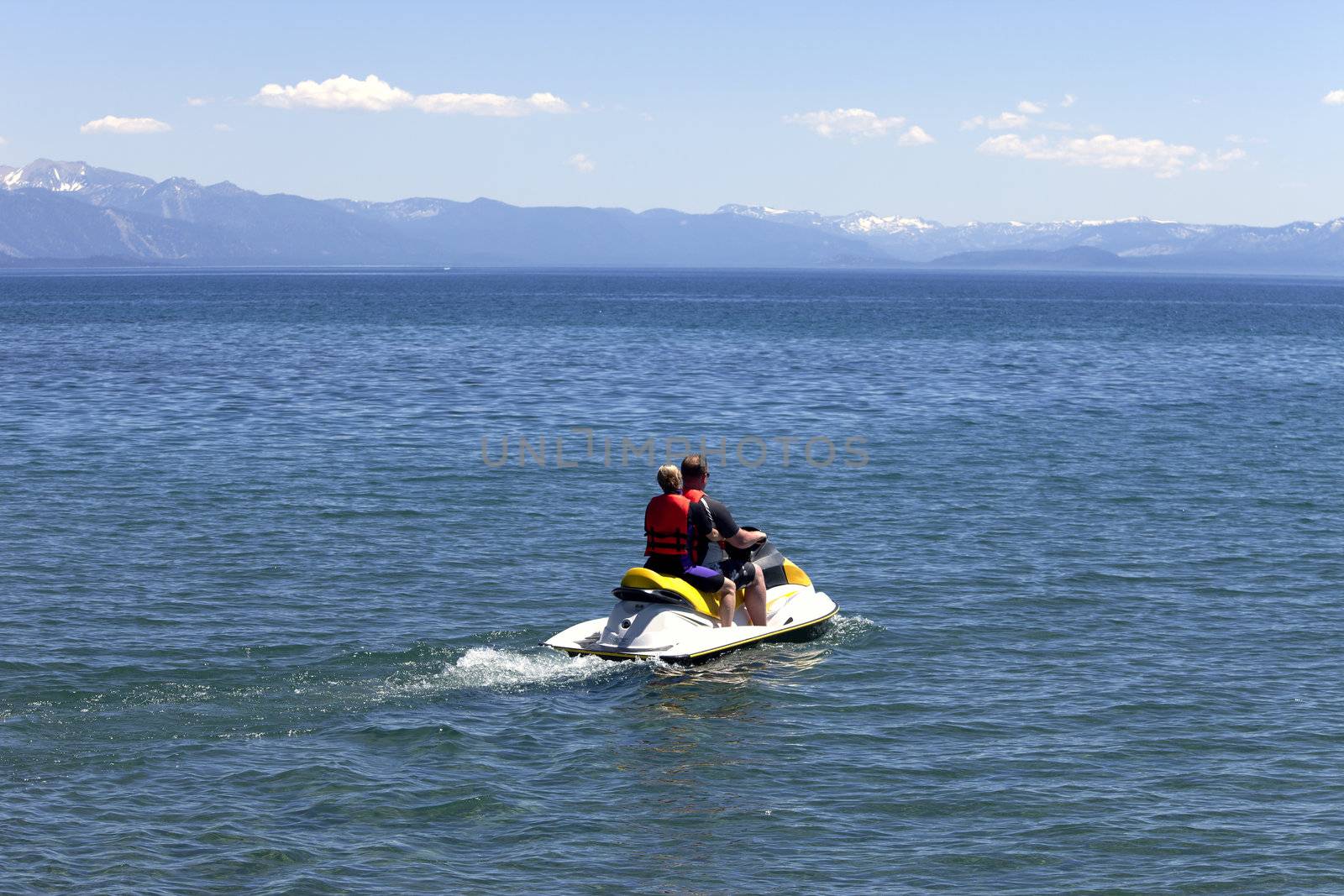 Riding the water scooter on Lake Tahoe, California.