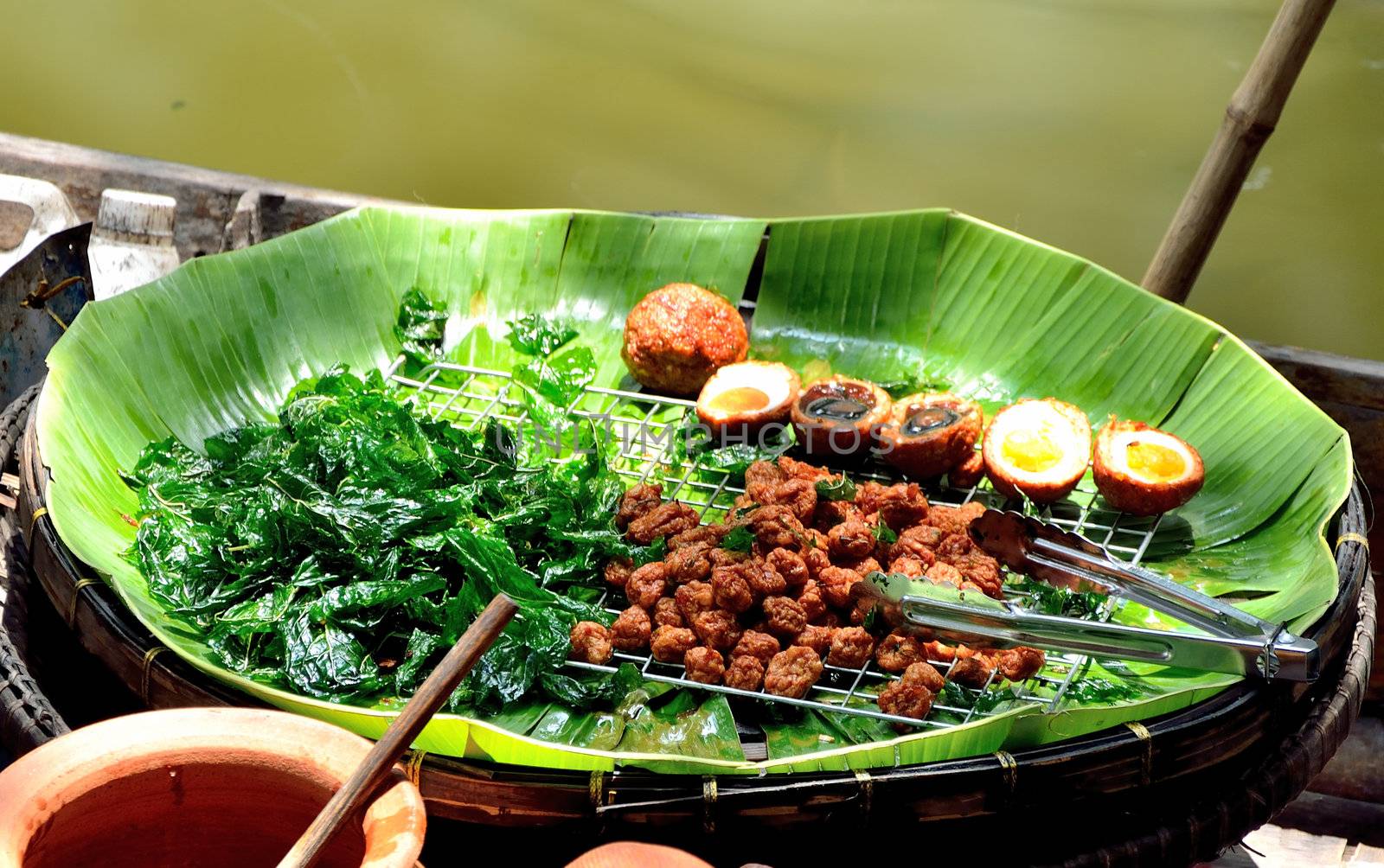 Fried fish-paste balls in boat