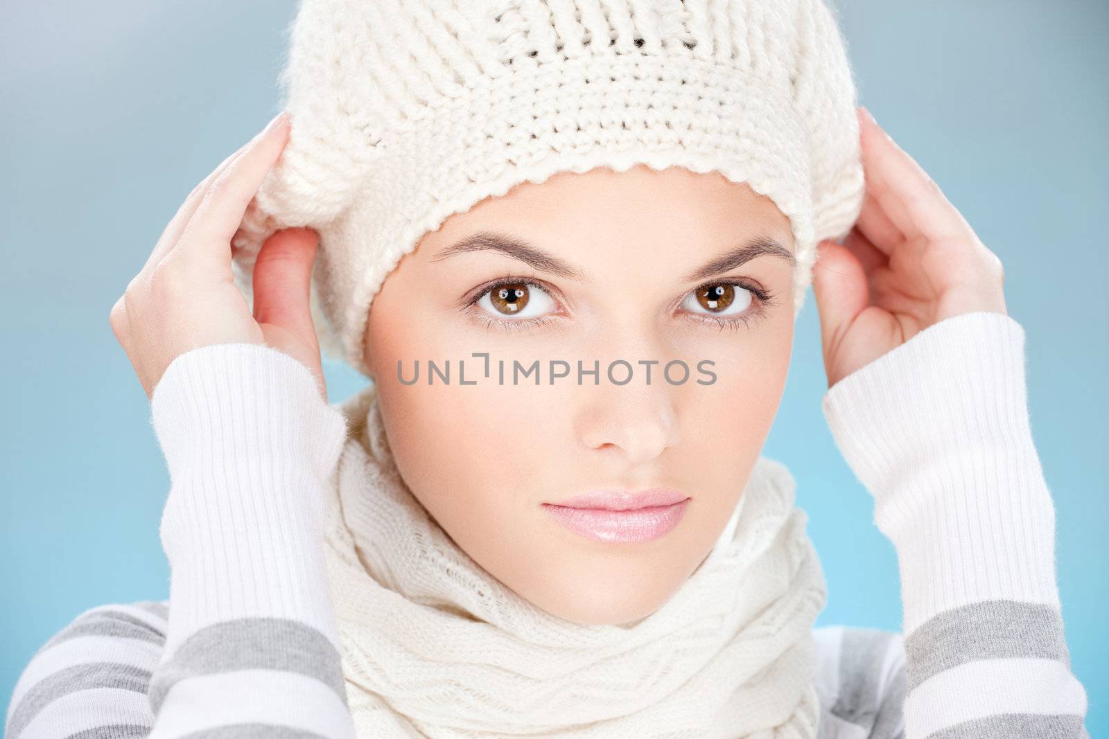 pretty woman with scarf and winter cap