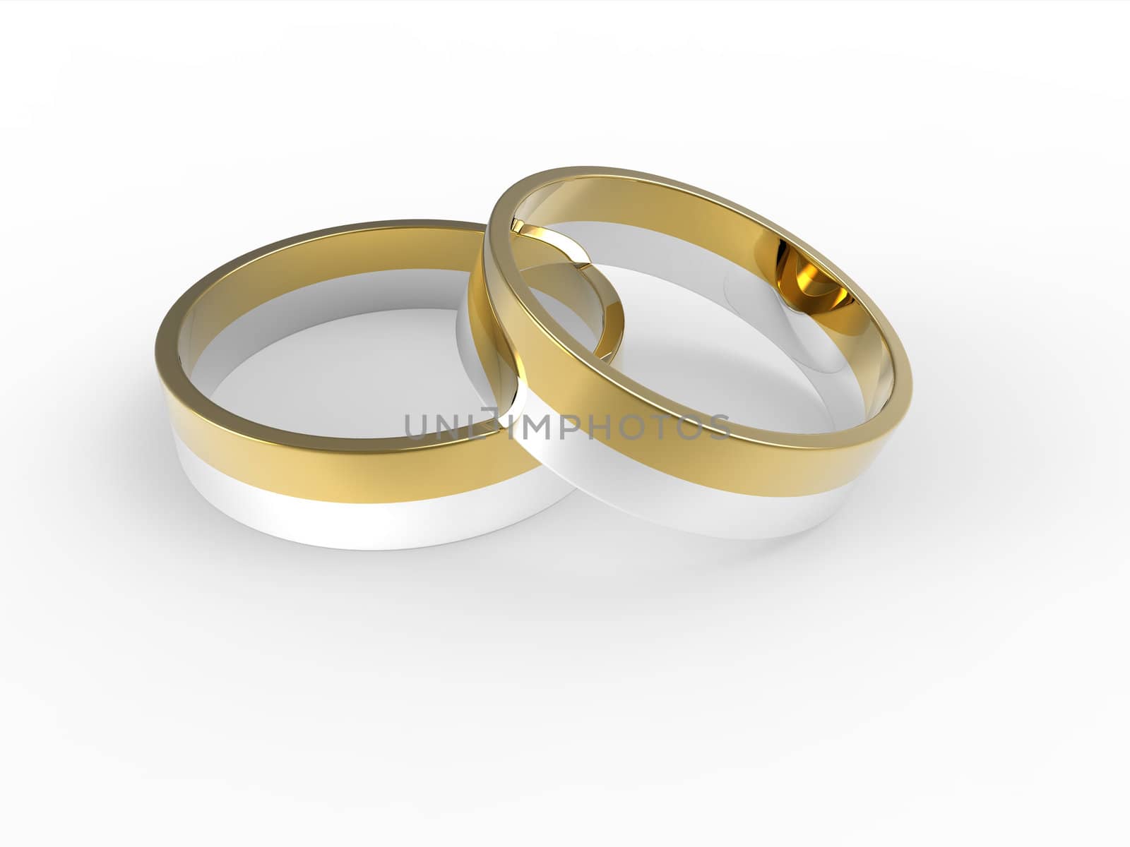 Golden and silver wedding rings isolated on white background by vermicule