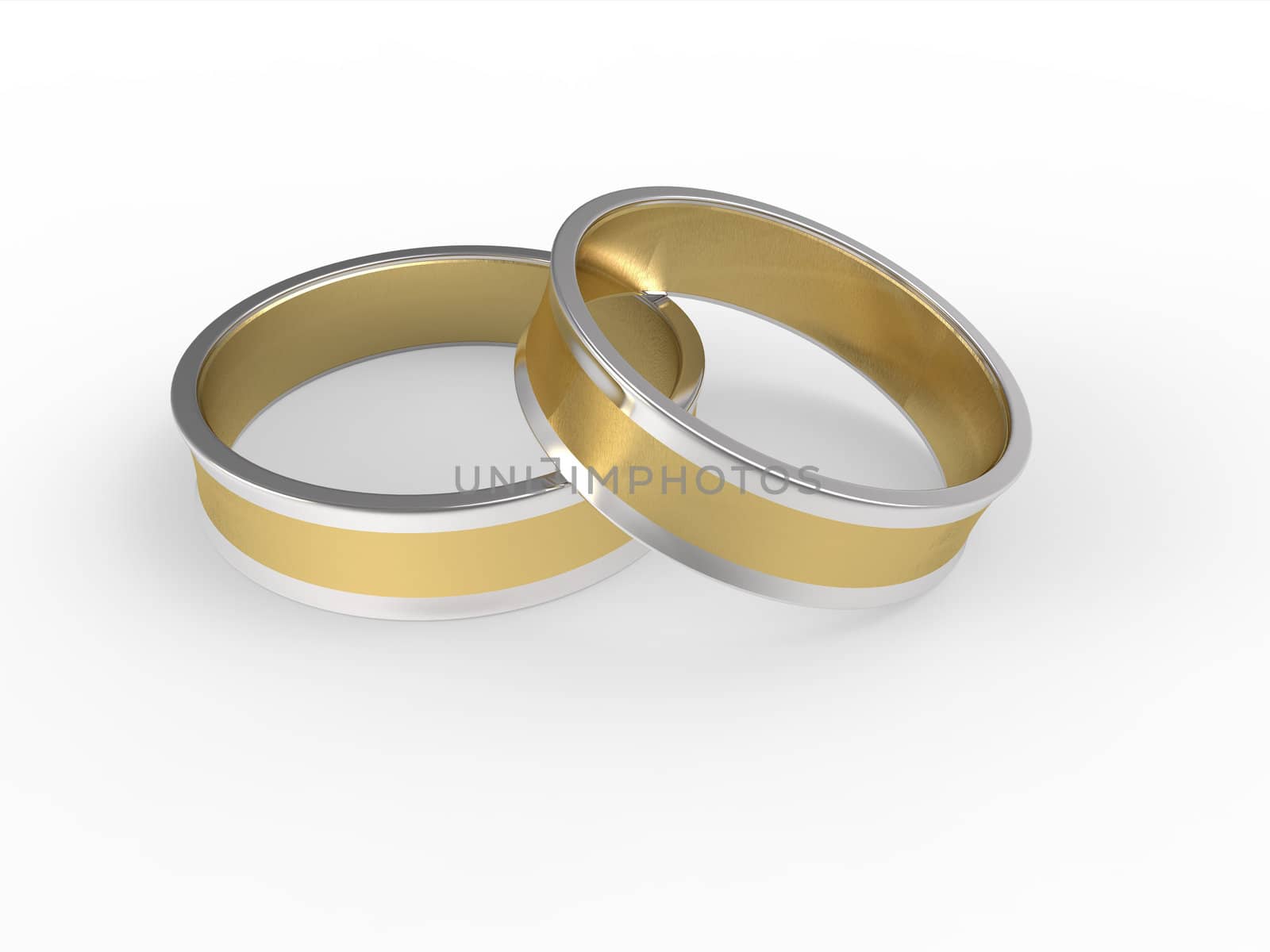 Golden and silver wedding rings isolated on white background