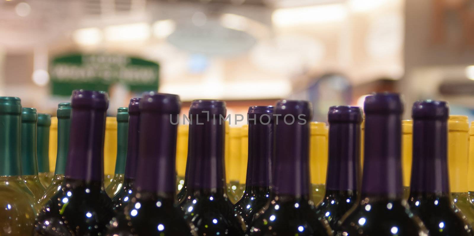 Wine bottles shot with limited depth of field on display in a liquor store