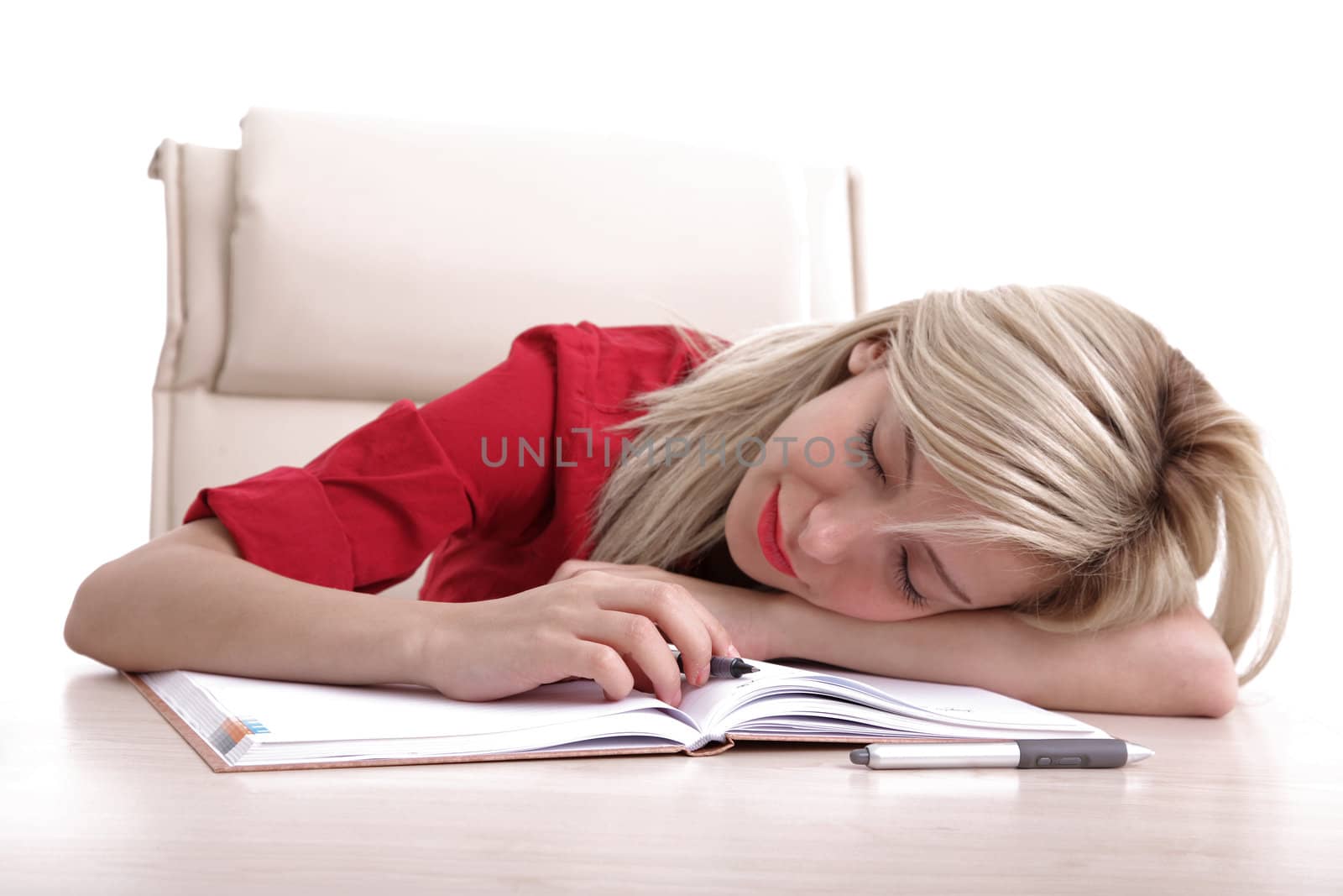 Blond office girl sleeping