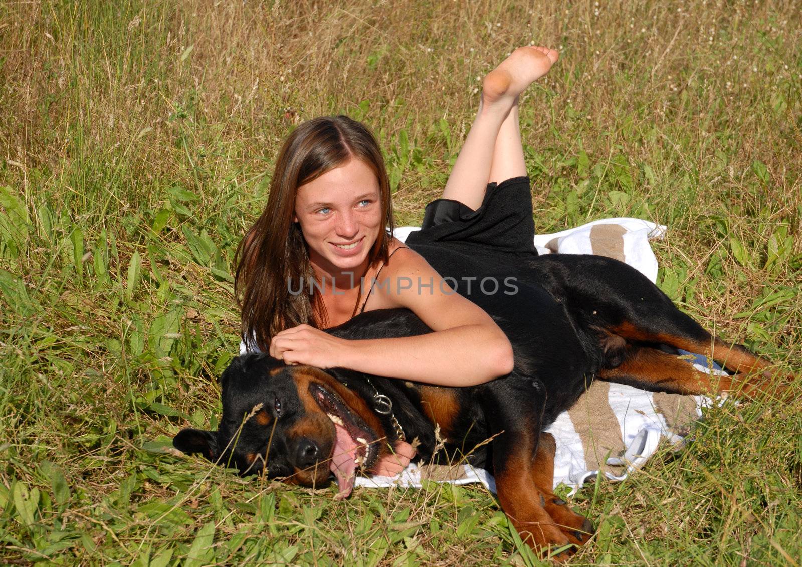 young girl and her best friend purebred rottweiler