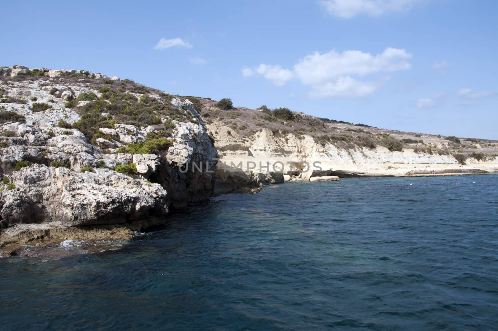 Blue sea and rocks on the malta beach