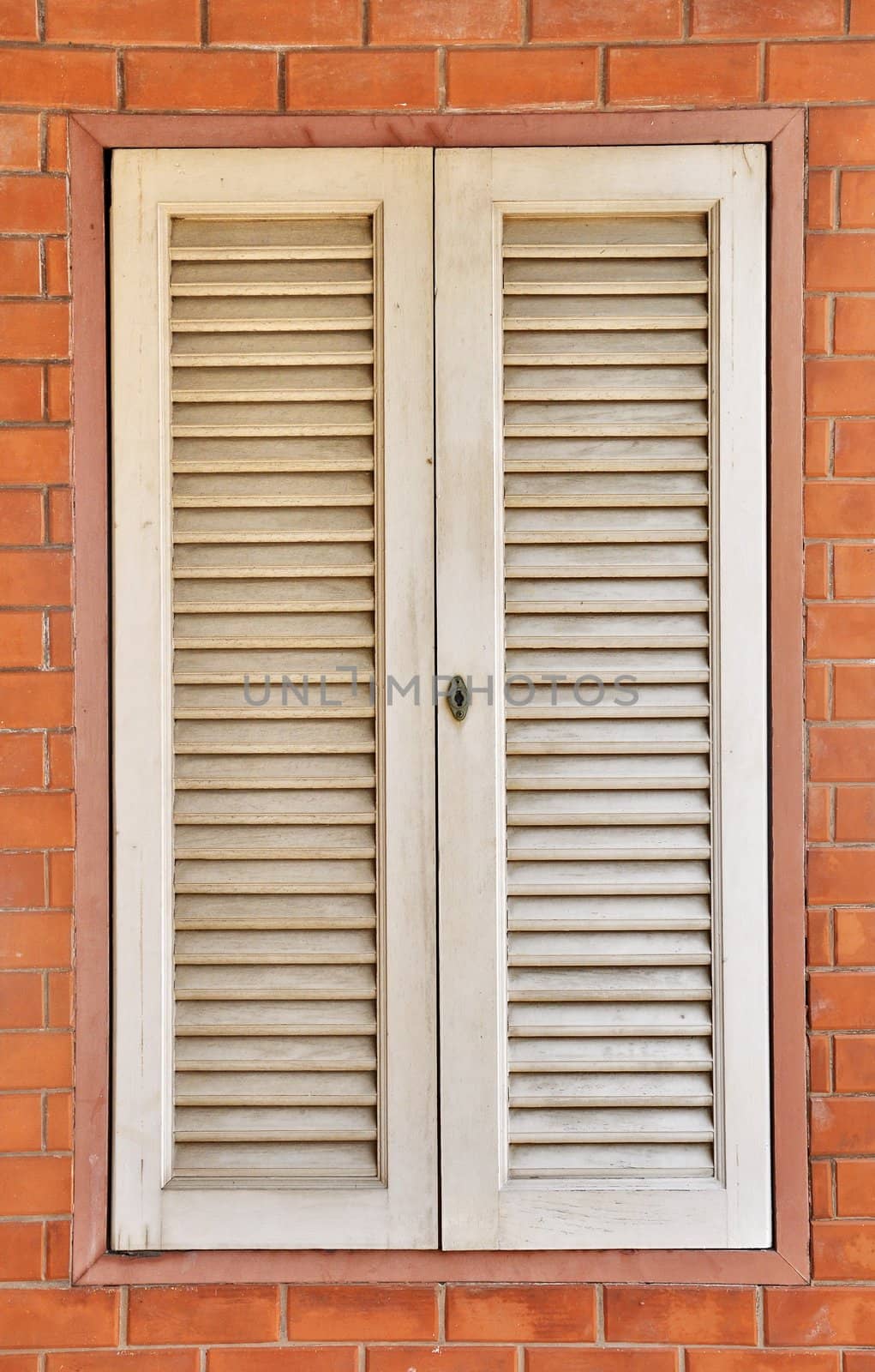 White window on red wall 
