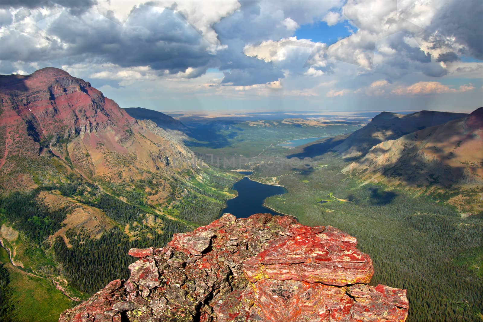 Mountaintop view of rugged alpine scenery in Glacier National Park.