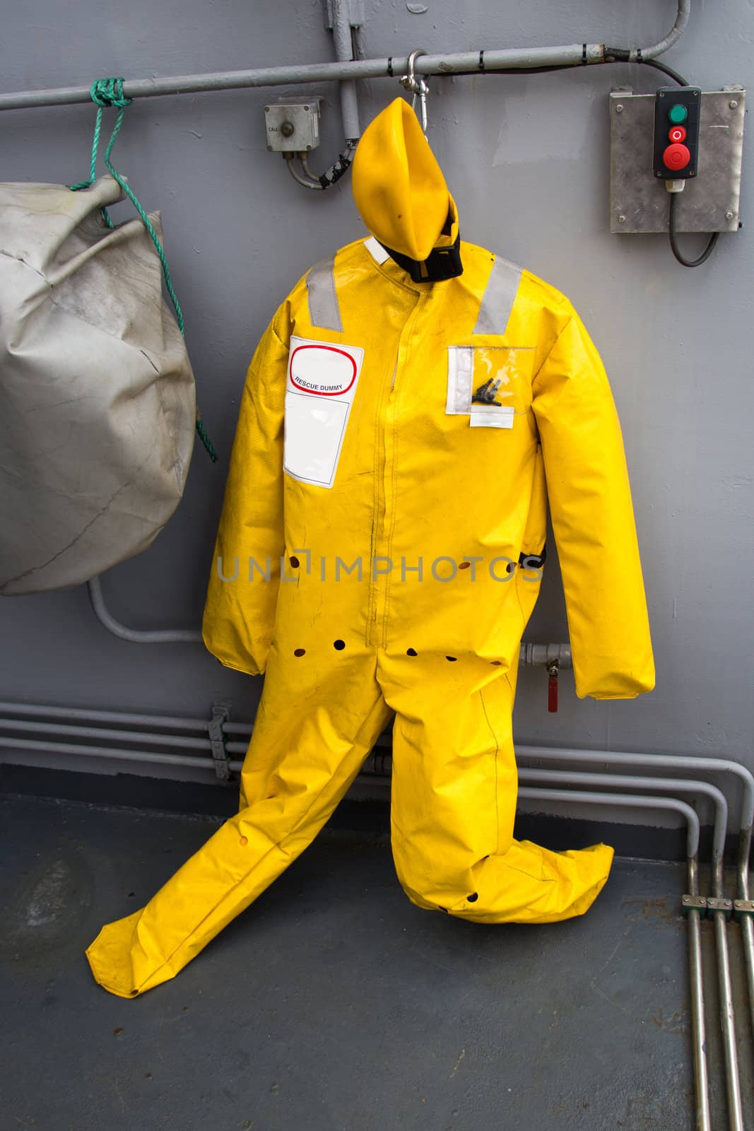 Rescue Dummy on war ship cabin wall