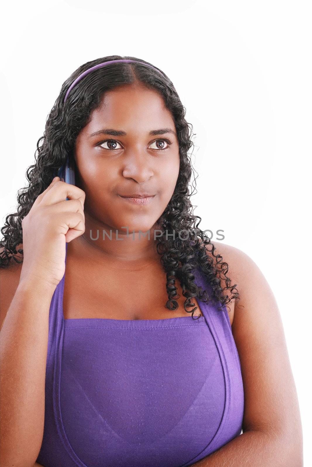 young African American woman talking on a cell phone with a upset expression on her face