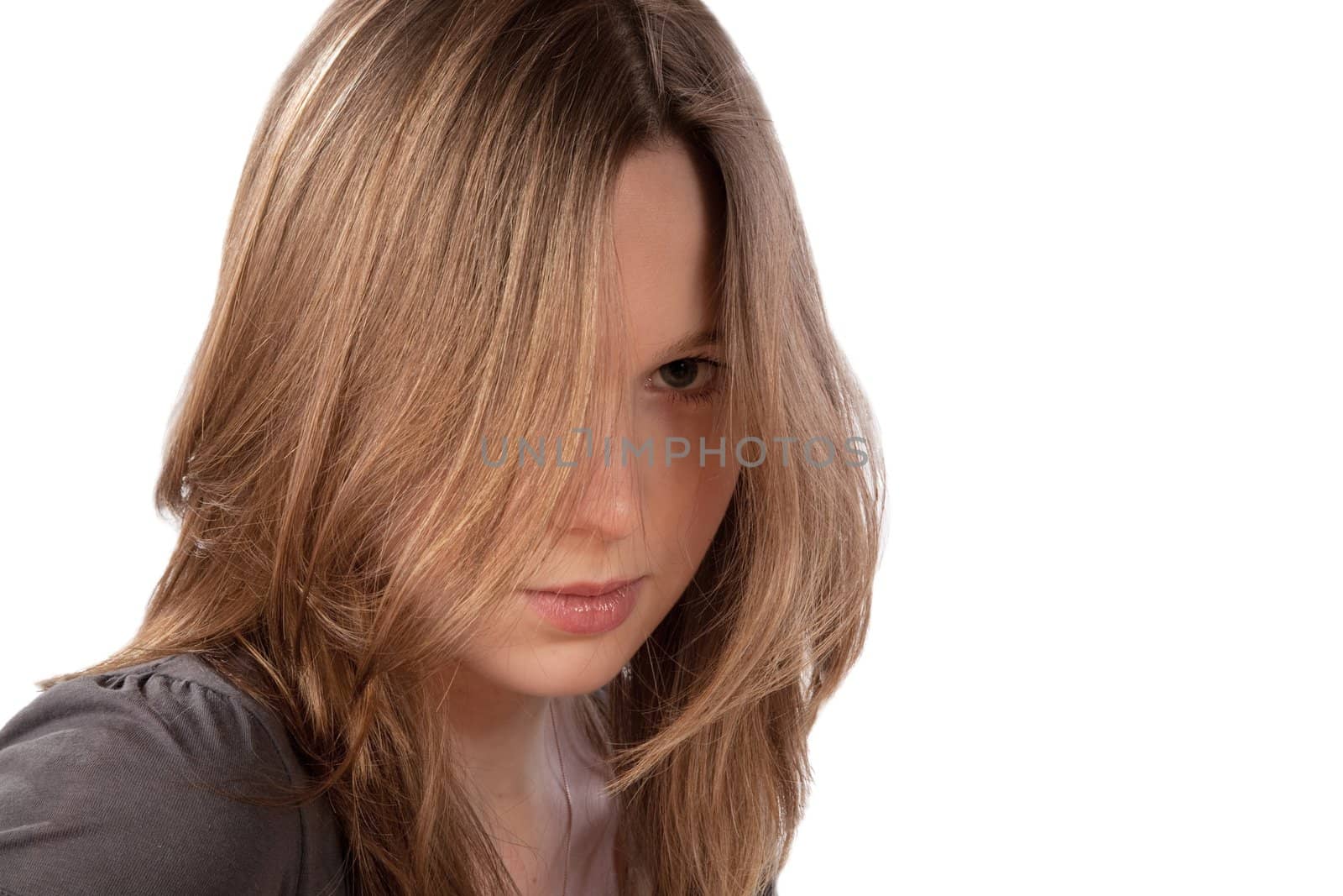 girl with the dismissed hair and a severe look isolated