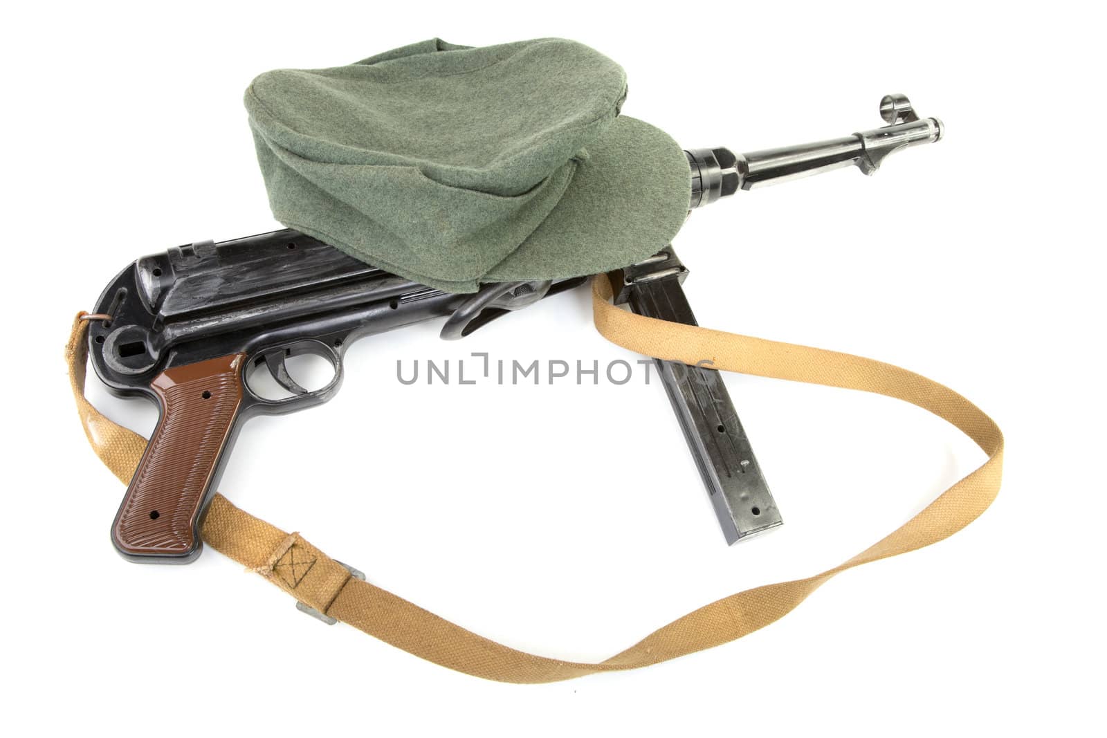 Germany in the Second World War. Composition with standard army field cap (kepi) and submachine gun MP40 
