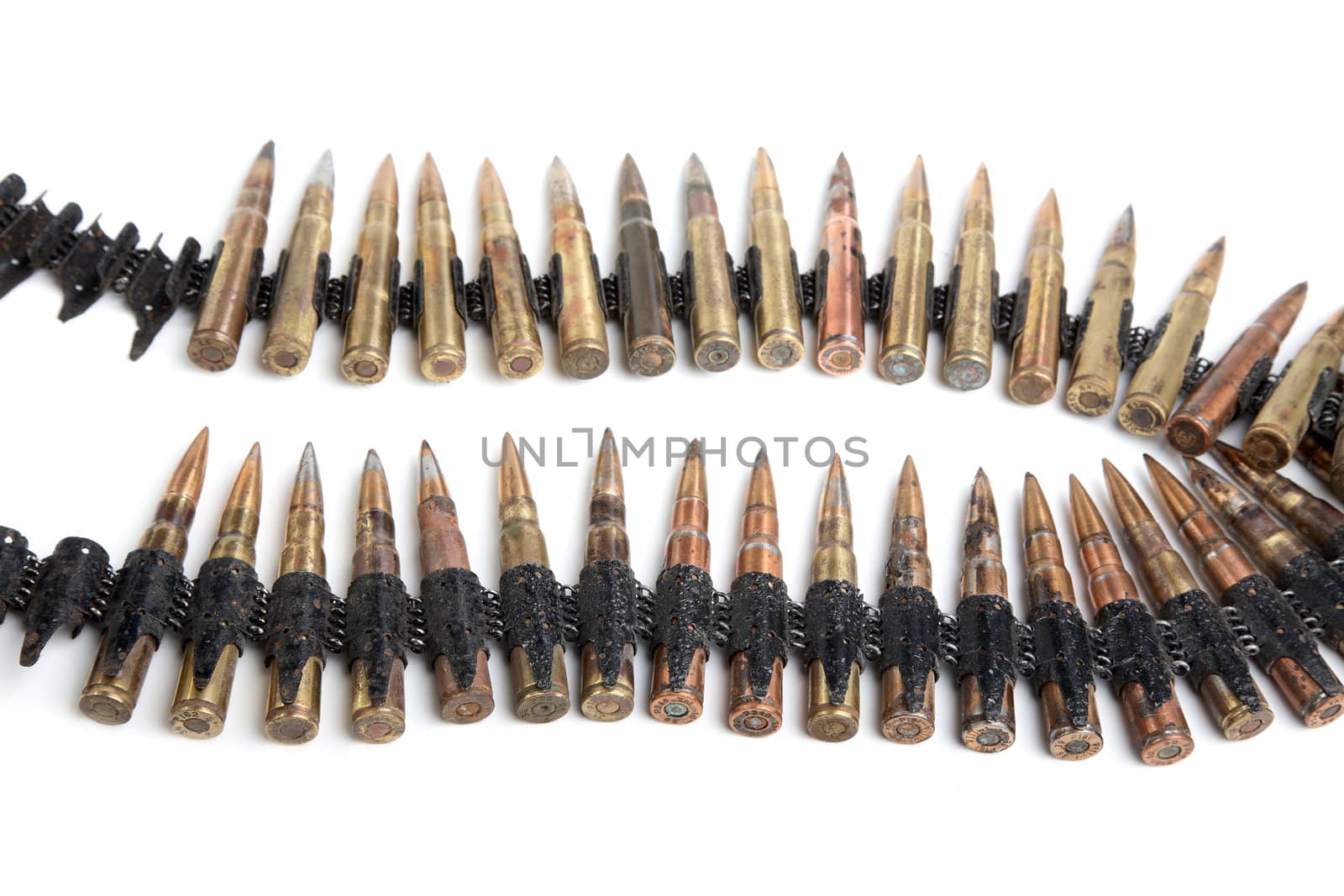 Machine-gun tape with cartridges of times  Second World War on a white background