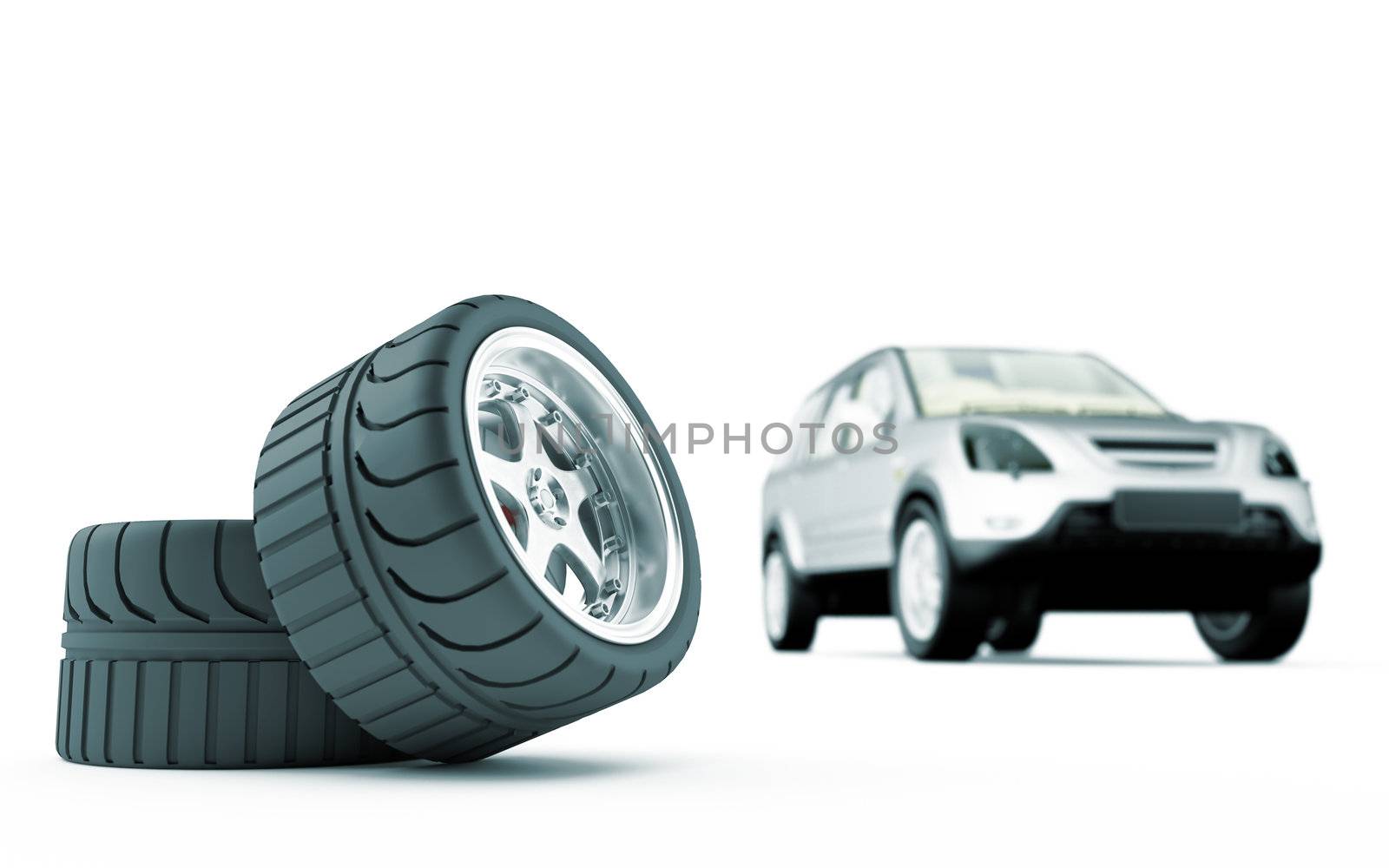 Two automobile wheels on a back background the car