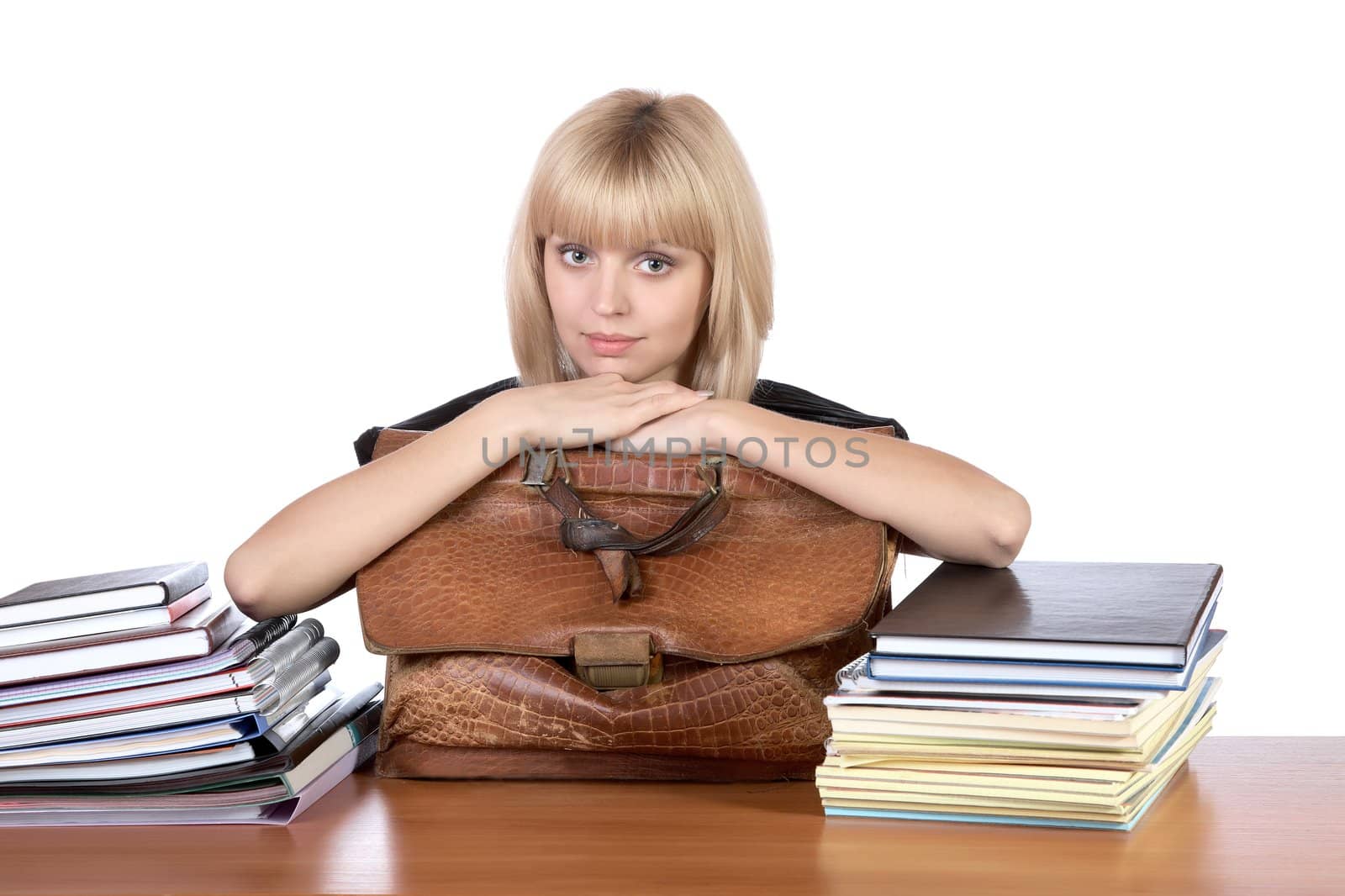 The girl with an old briefcase in hands on a white background