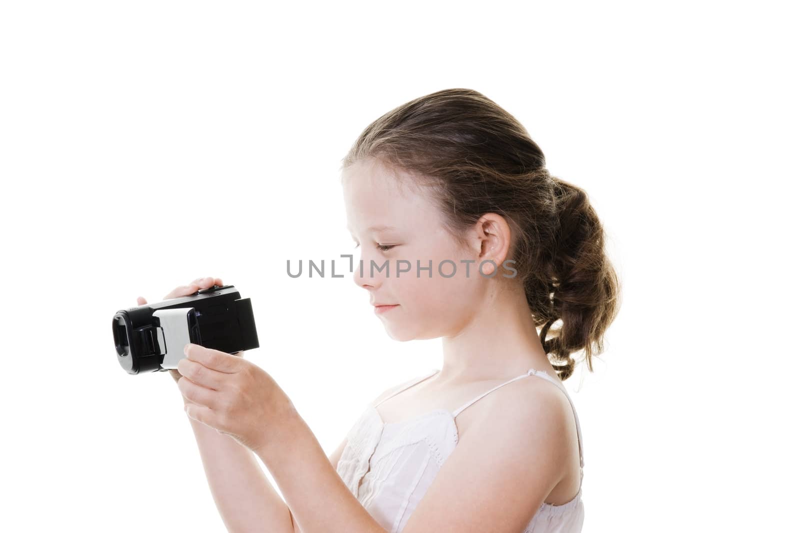 preteen girl with camcorder isolated on white