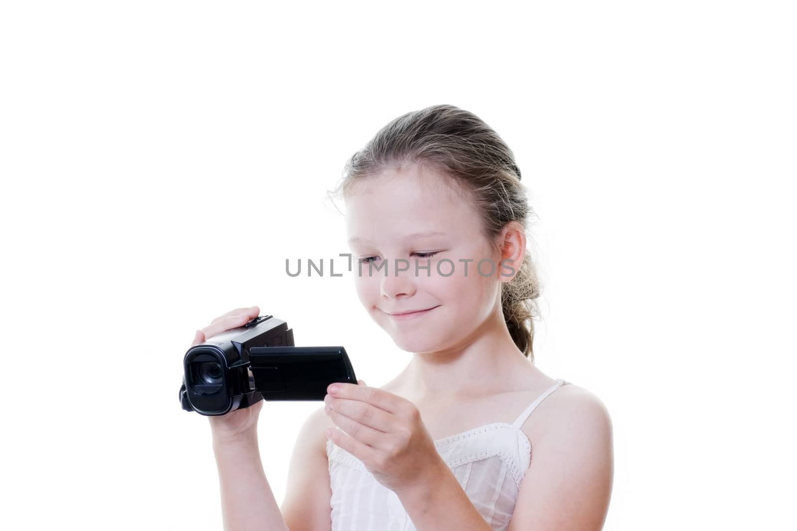 preteen girl with camcorder isolated on white