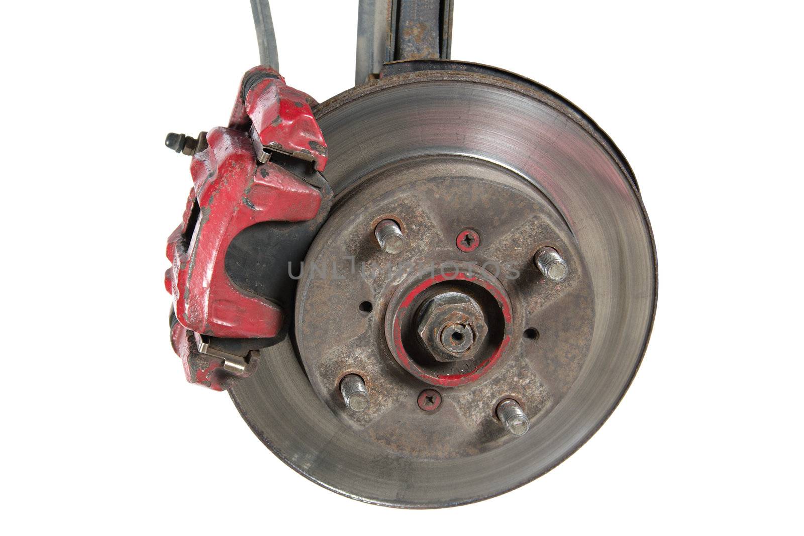 Old brake pads and disk, isolated on a white background
