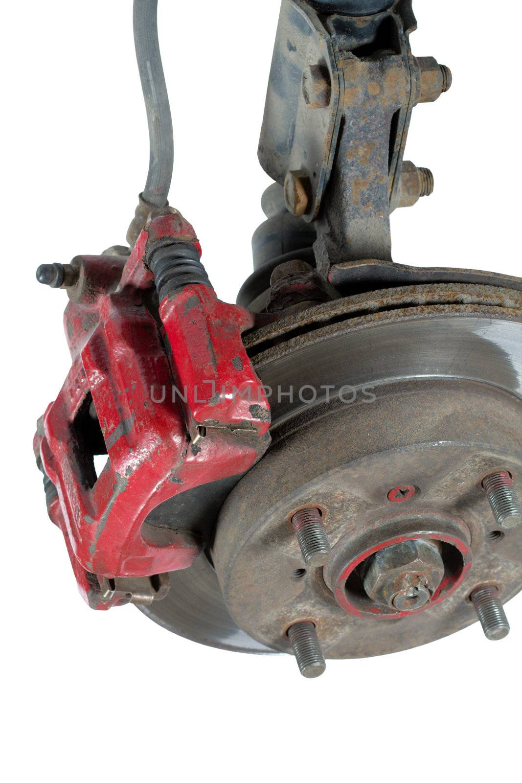Old brake pads and disk, isolated on a white background