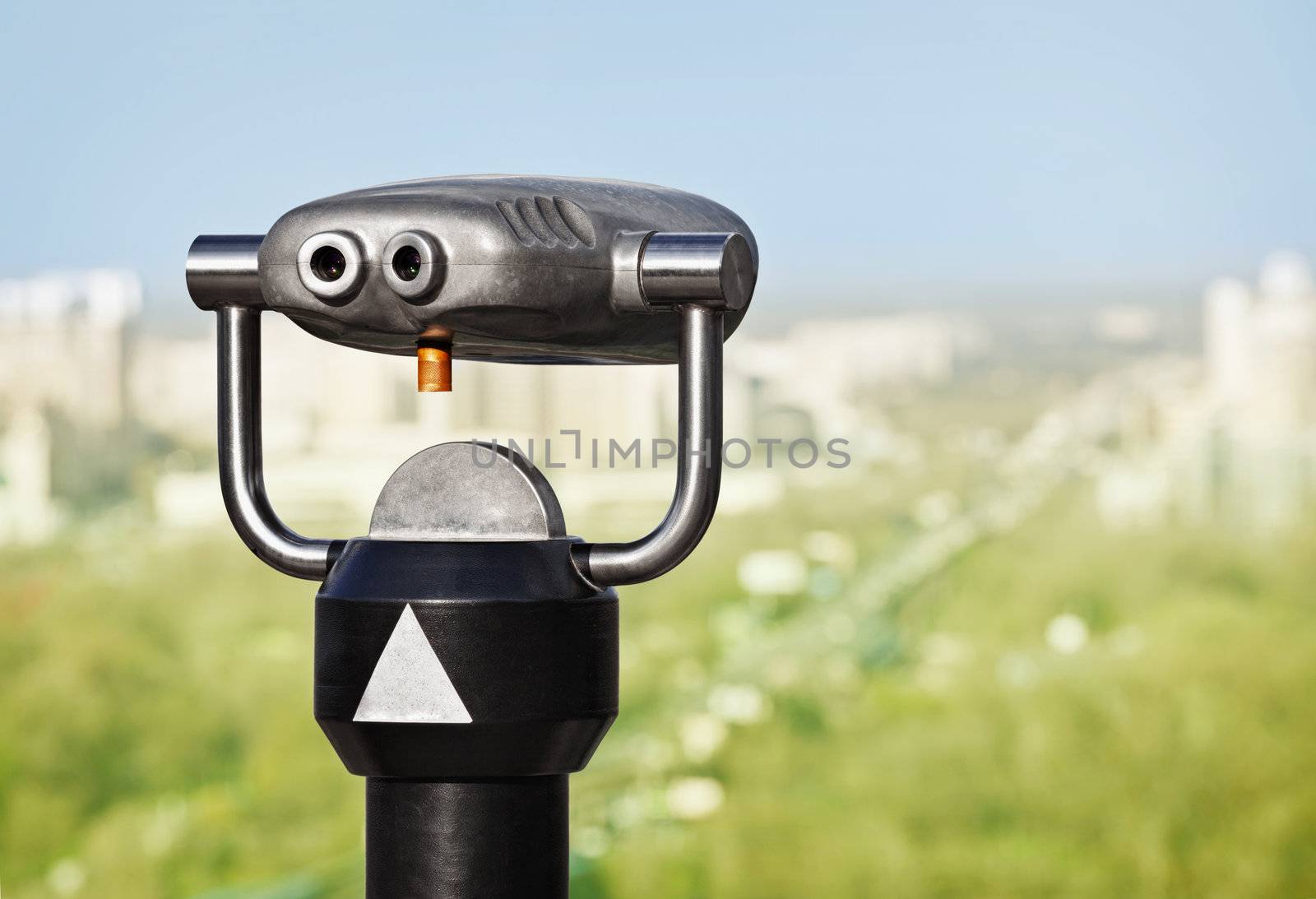 Binoculars to observe green city from a height