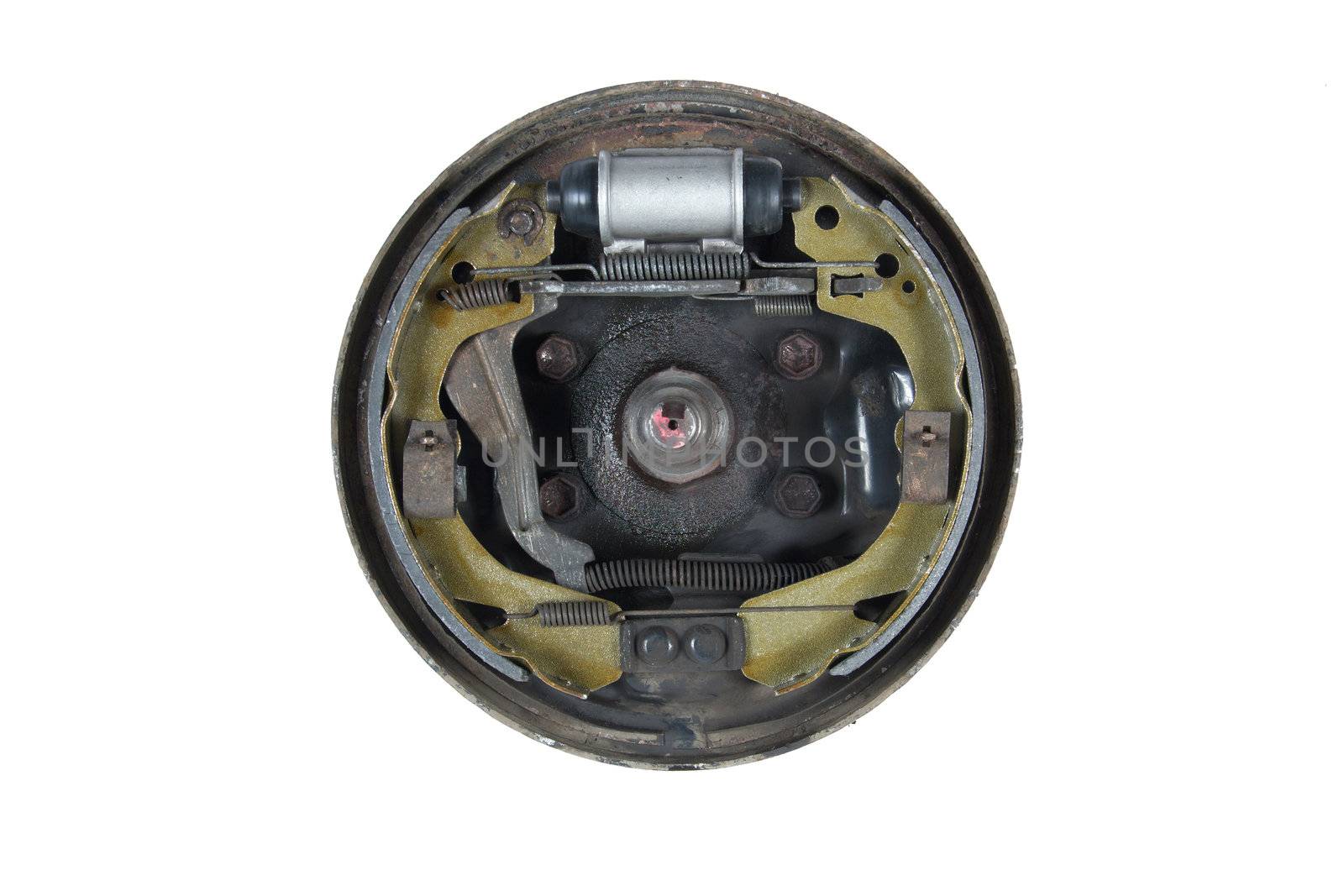 New brake pads and cylinder brake drum, isolated on a white background