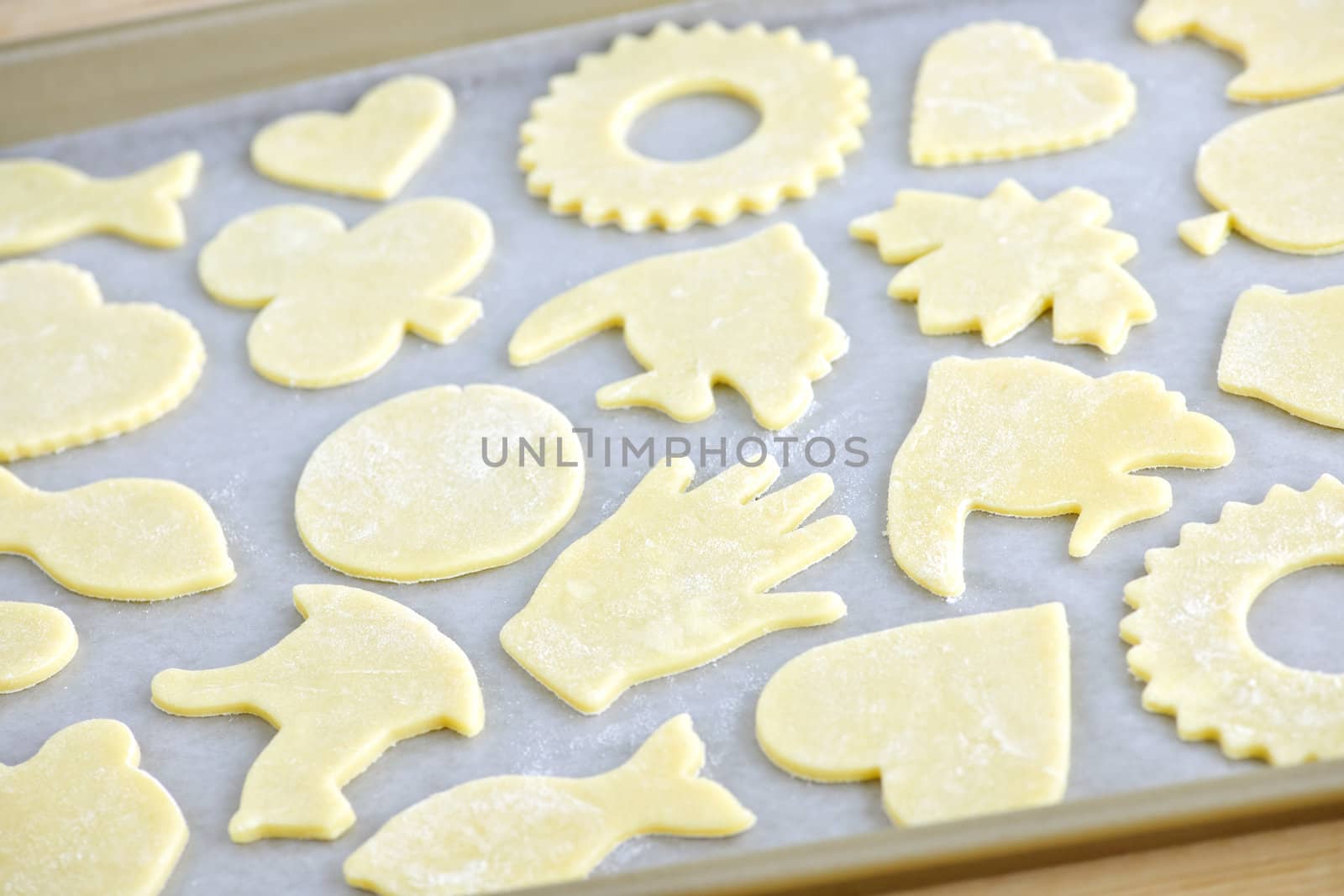 Cookie tray with raw homemade cookies ready for baking