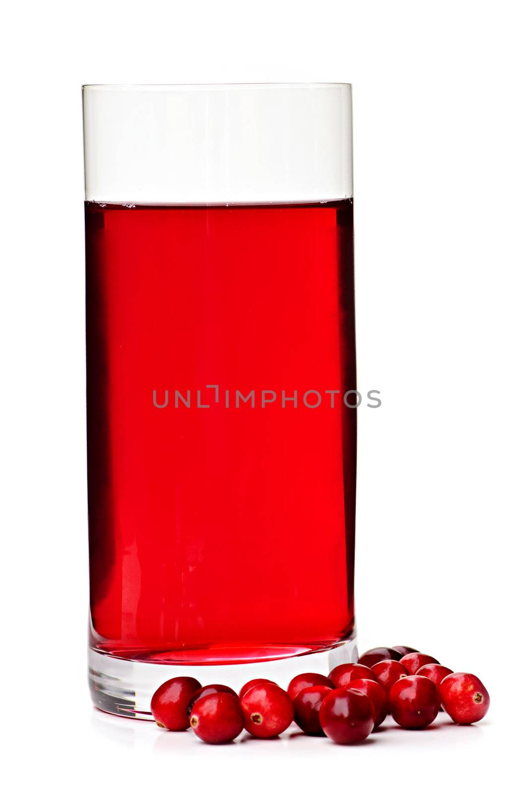 Cranberry juice in clear glass isolated on white background