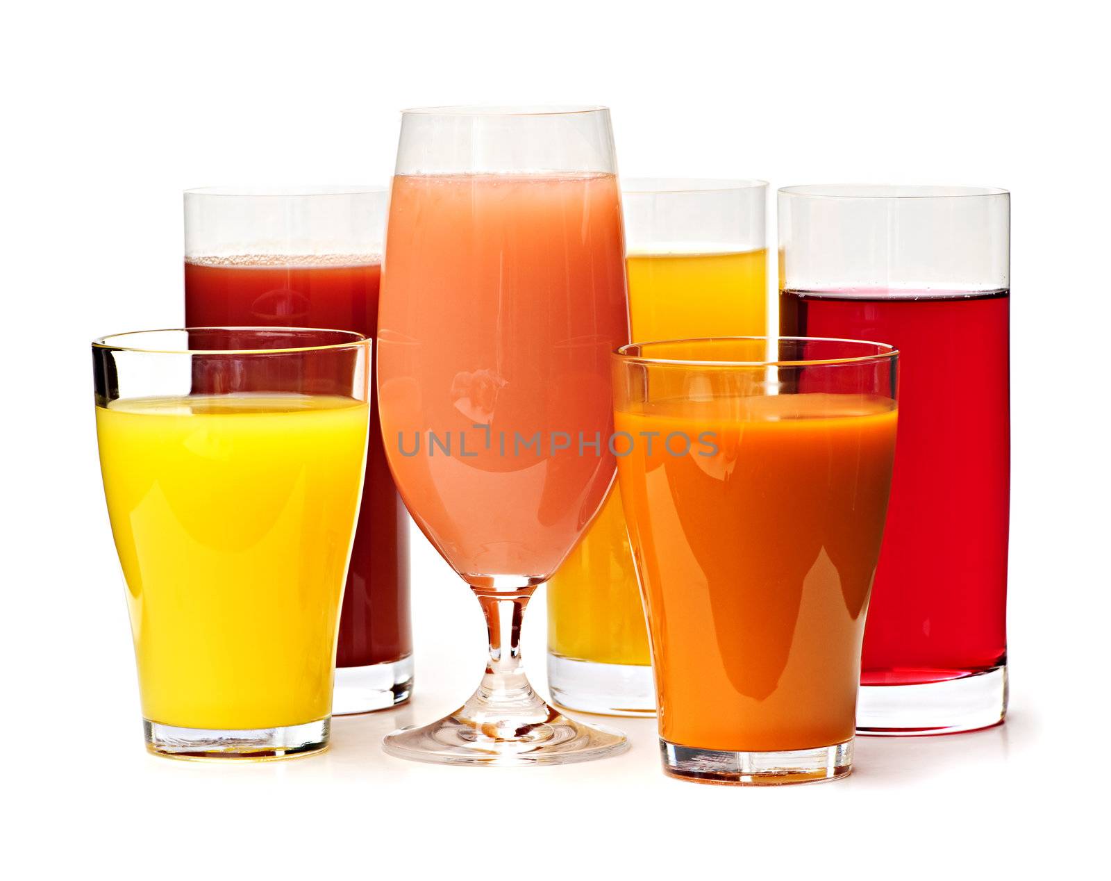 Various glasses of juices isolated on white background