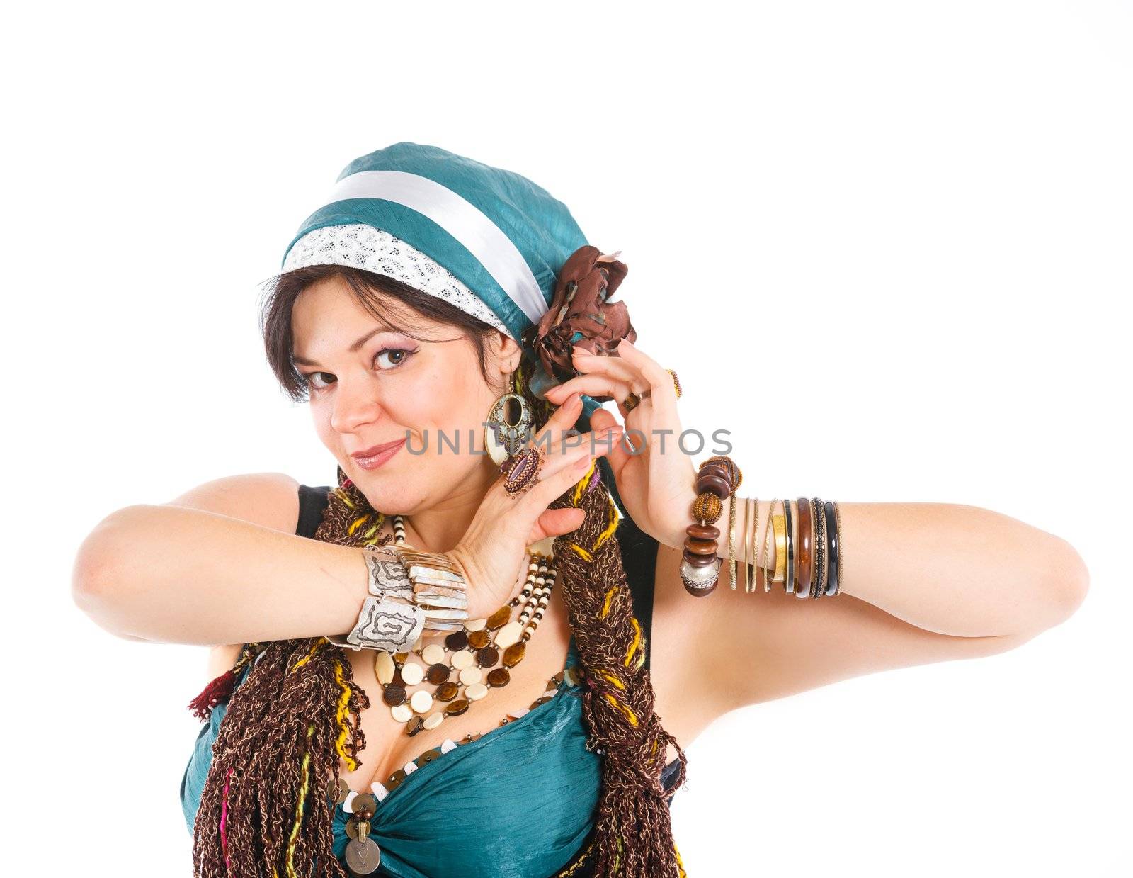 Oriental dancer in blue costume over white background